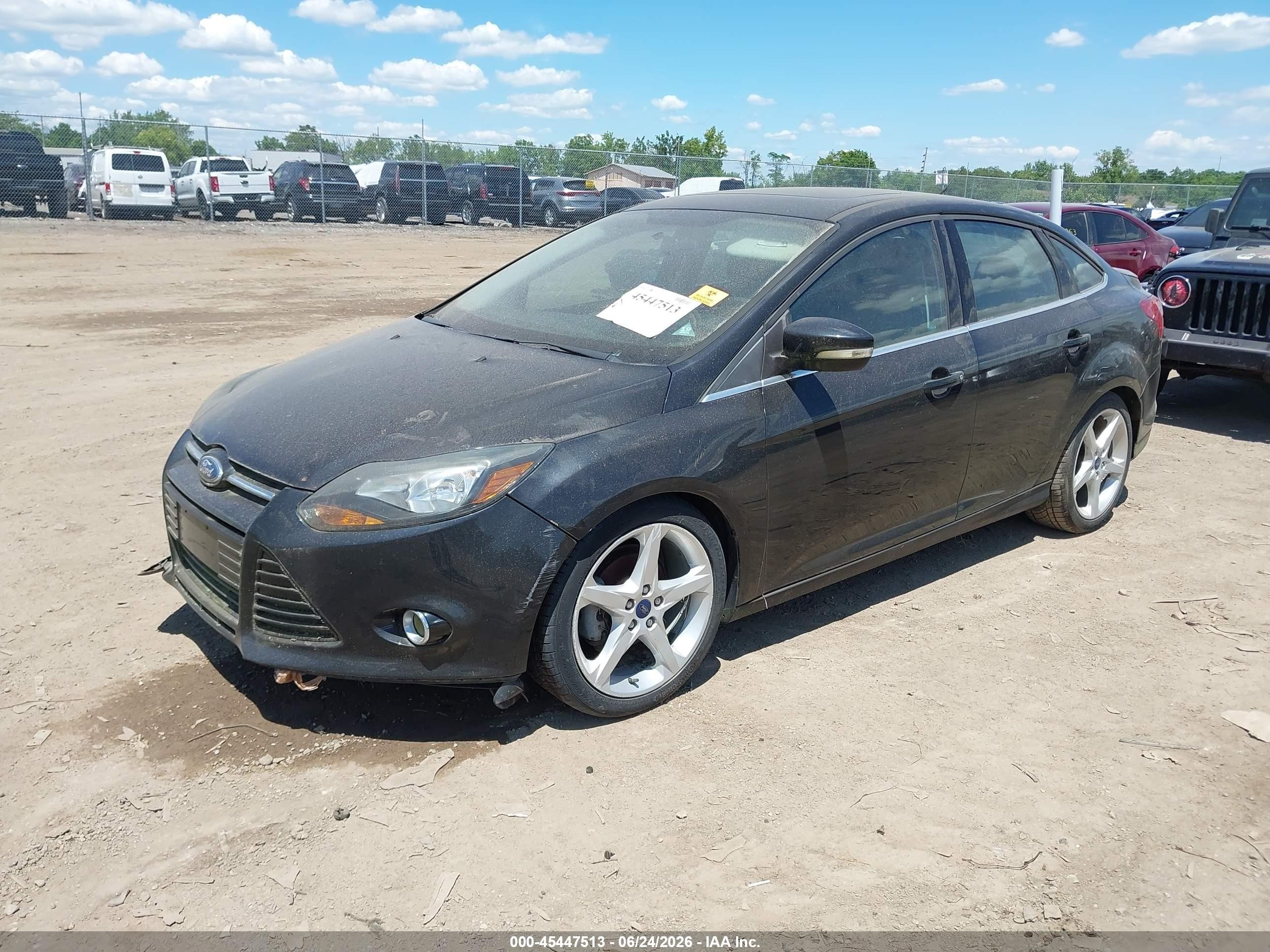 2014 Ford Focus Titanium Black vin: 1FADP3J20EL388938