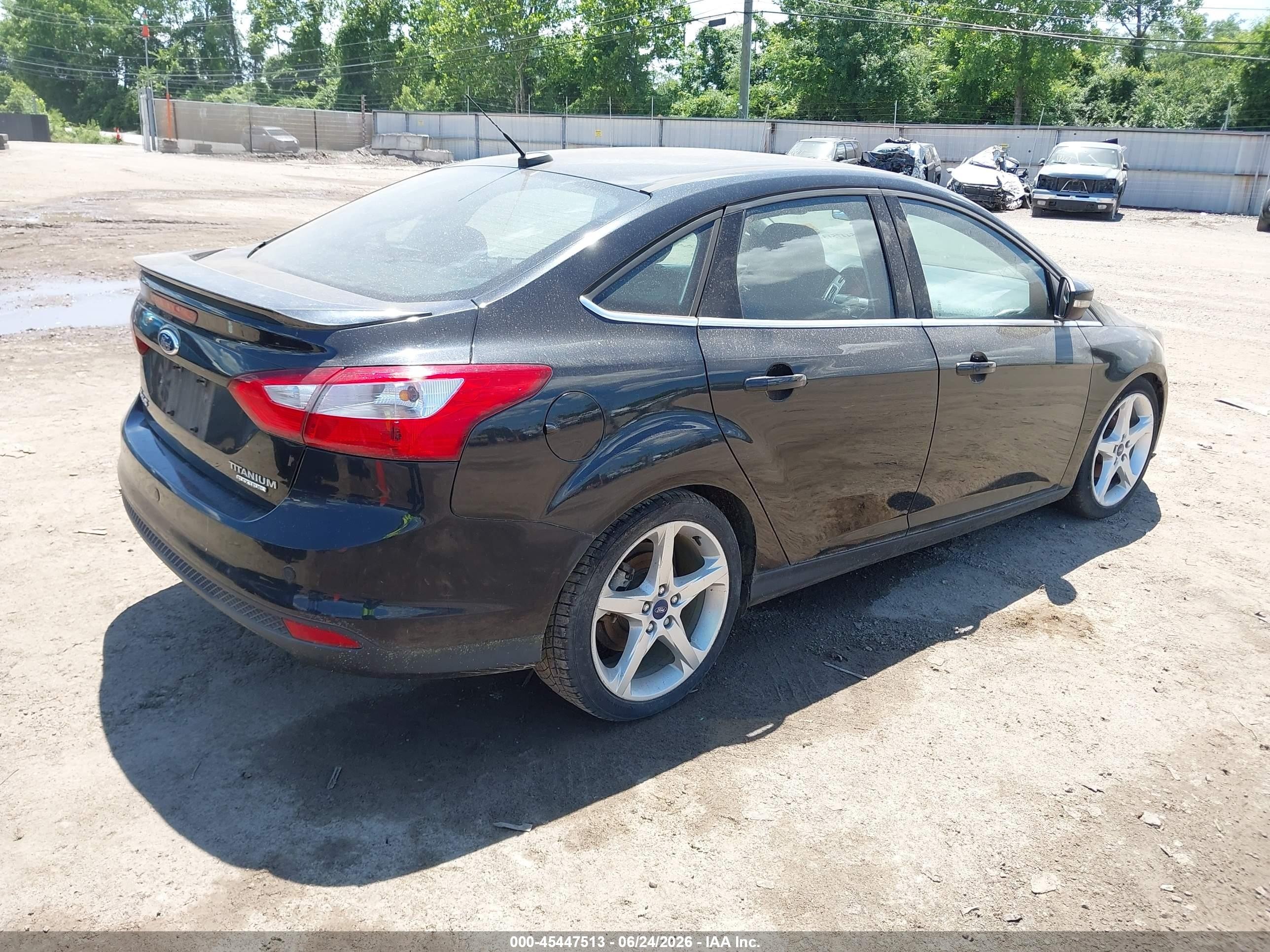 2014 Ford Focus Titanium Black vin: 1FADP3J20EL388938
