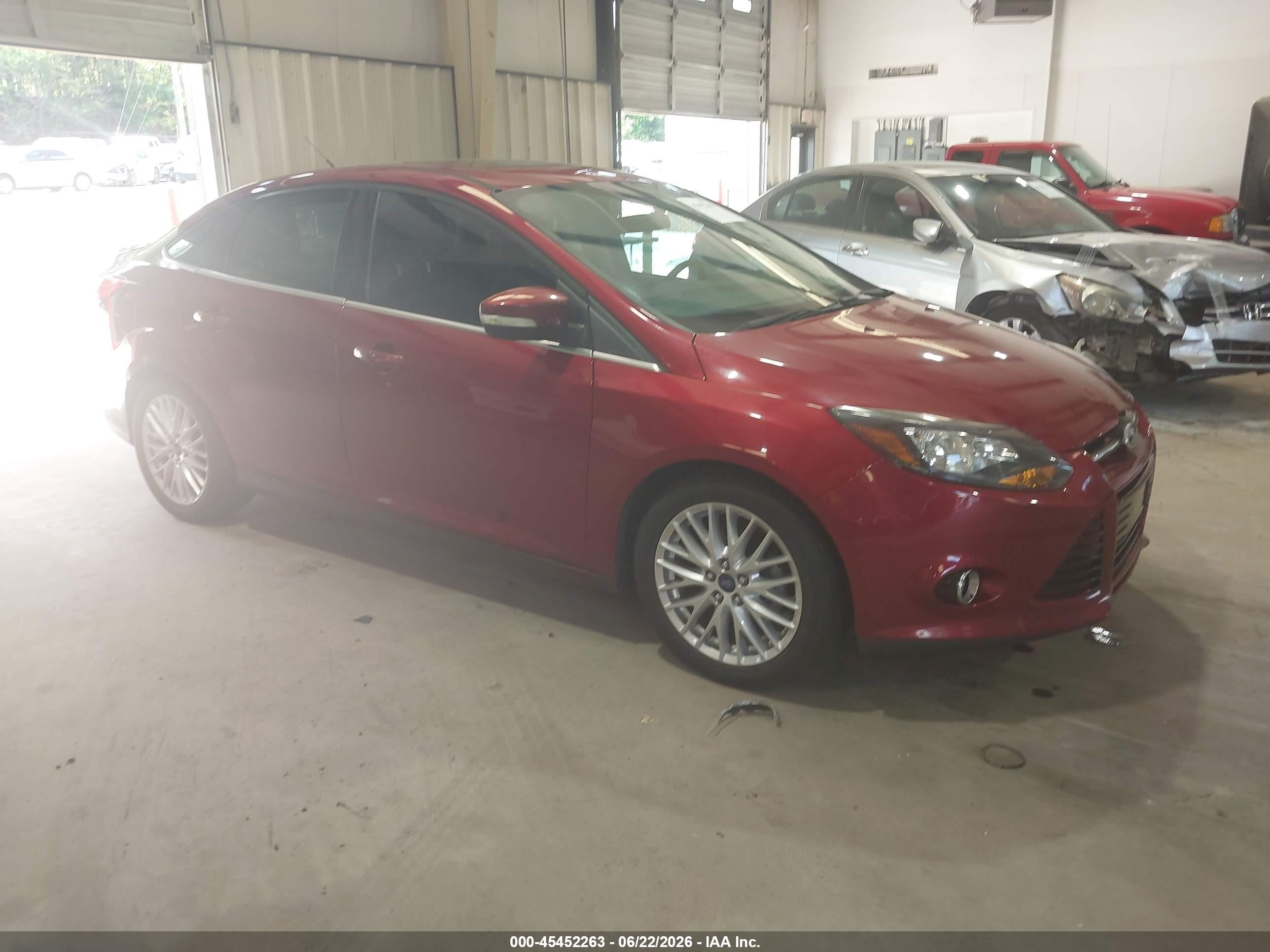 2014 Ford Focus Titanium Red vin: 1FADP3J20EL409755