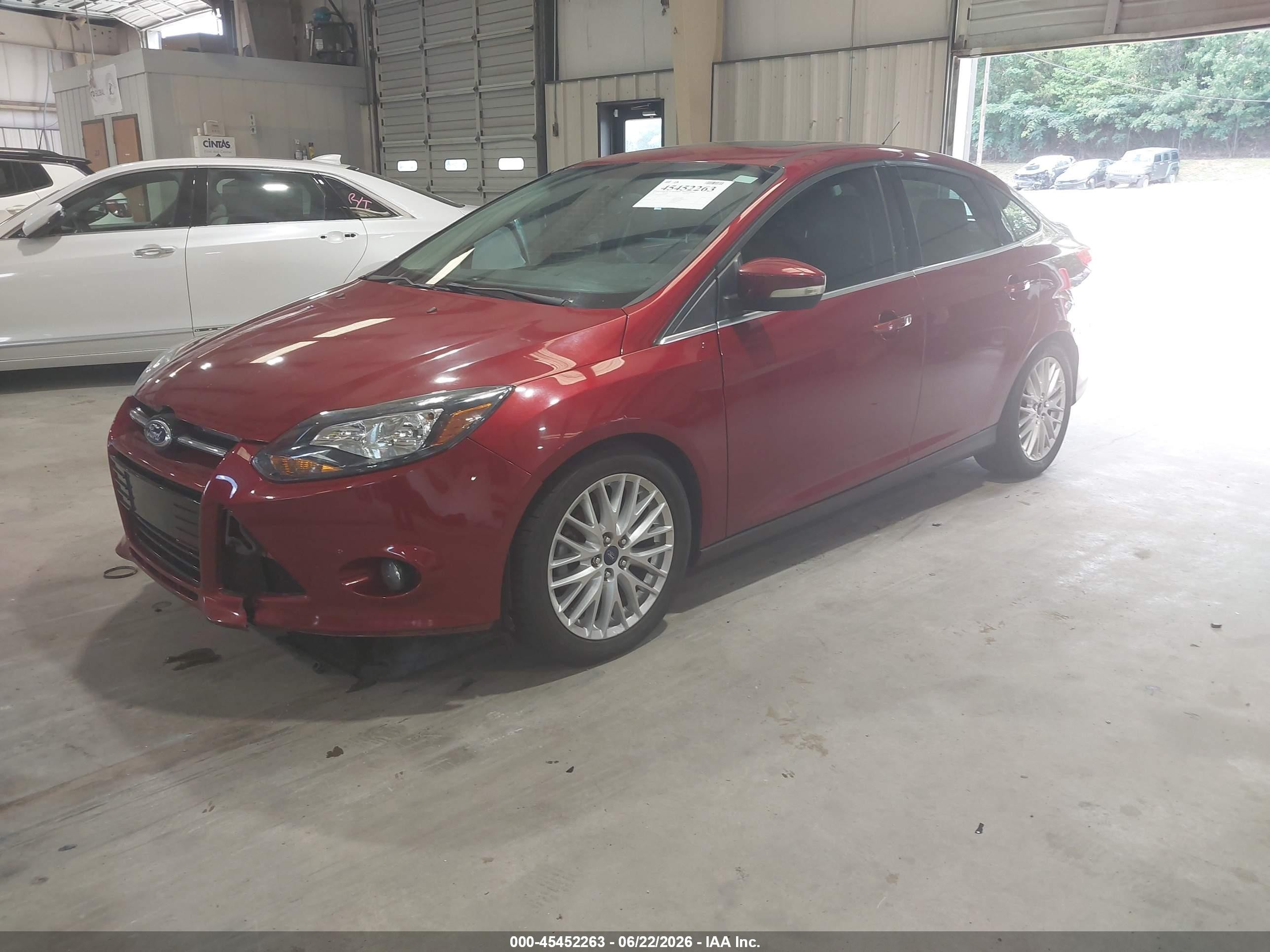 2014 Ford Focus Titanium Red vin: 1FADP3J20EL409755