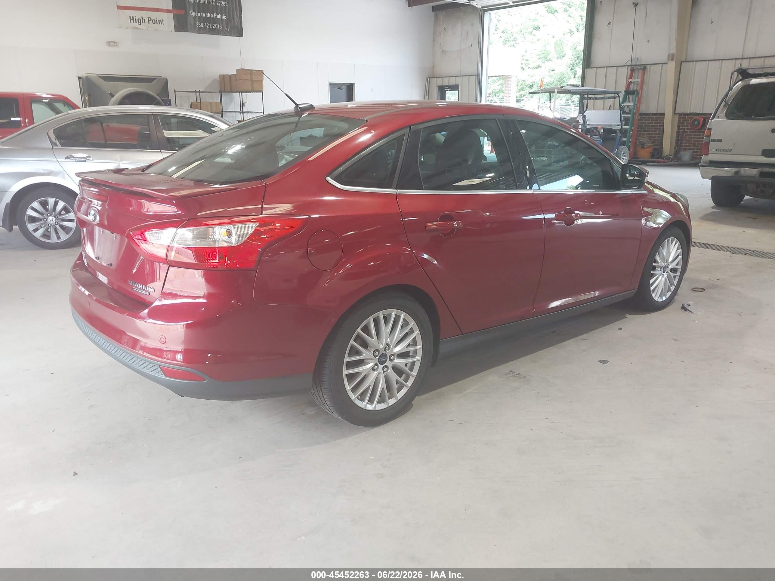 2014 Ford Focus Titanium Red vin: 1FADP3J20EL409755