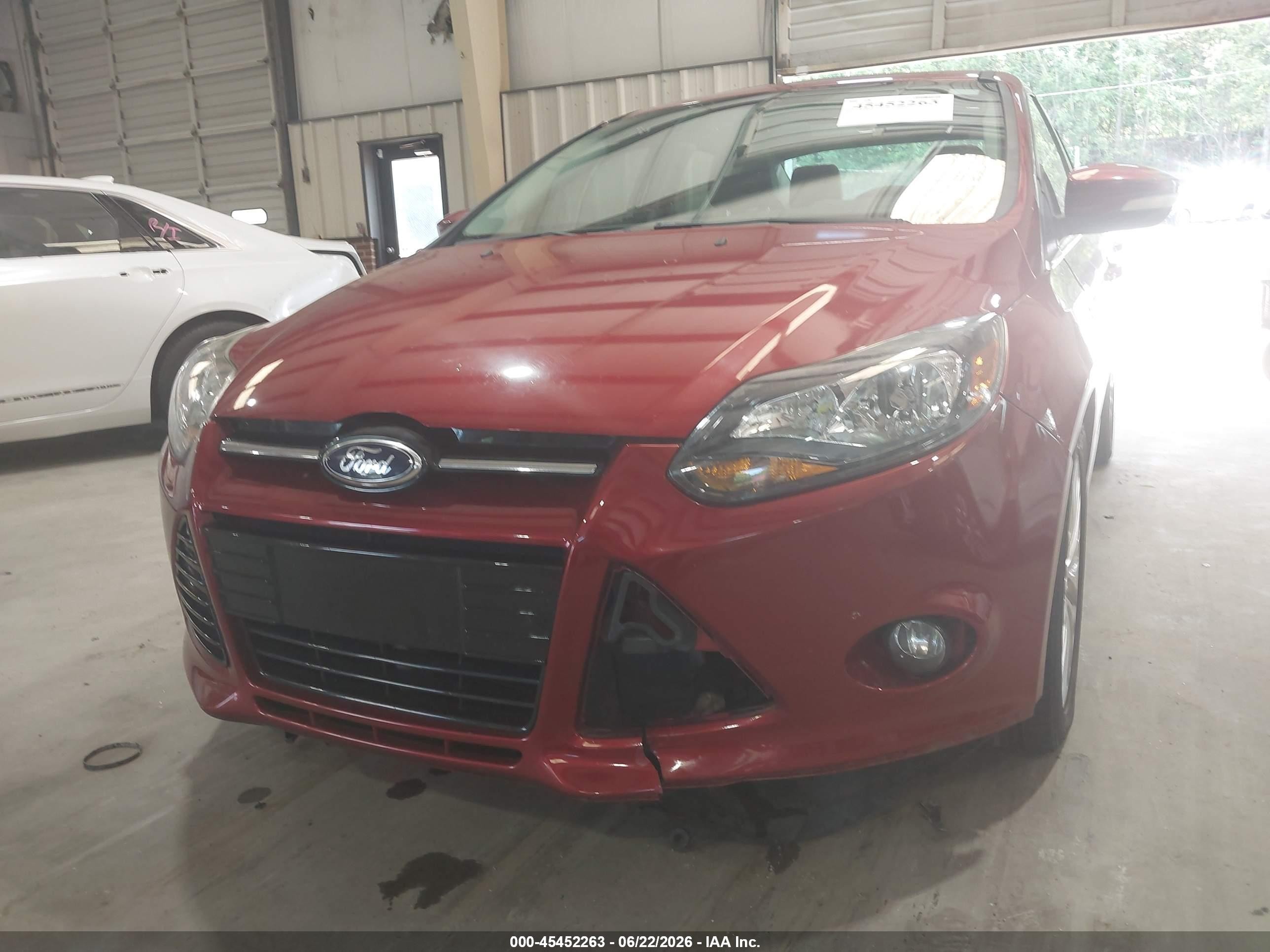 2014 Ford Focus Titanium Red vin: 1FADP3J20EL409755