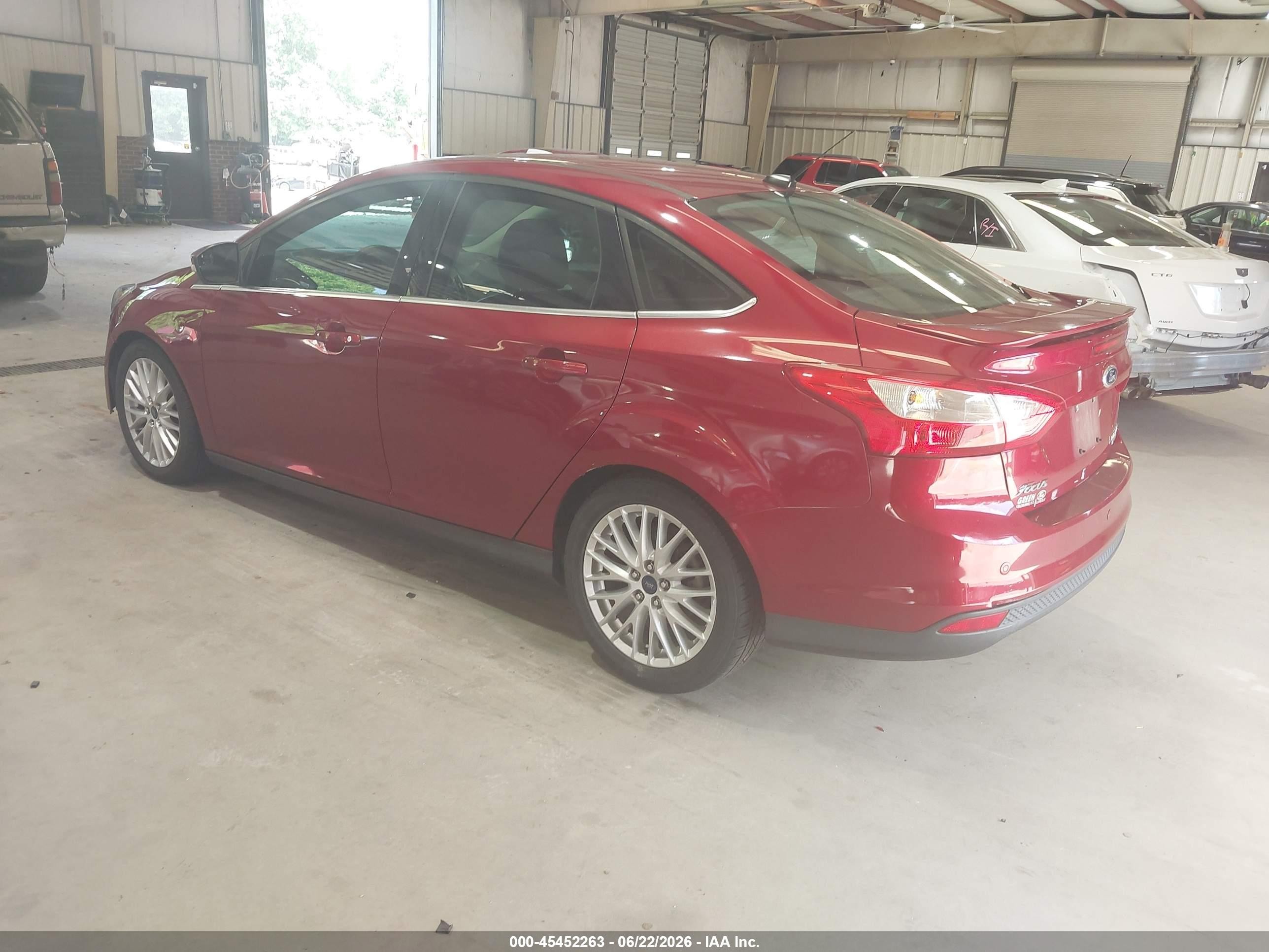 2014 Ford Focus Titanium Red vin: 1FADP3J20EL409755