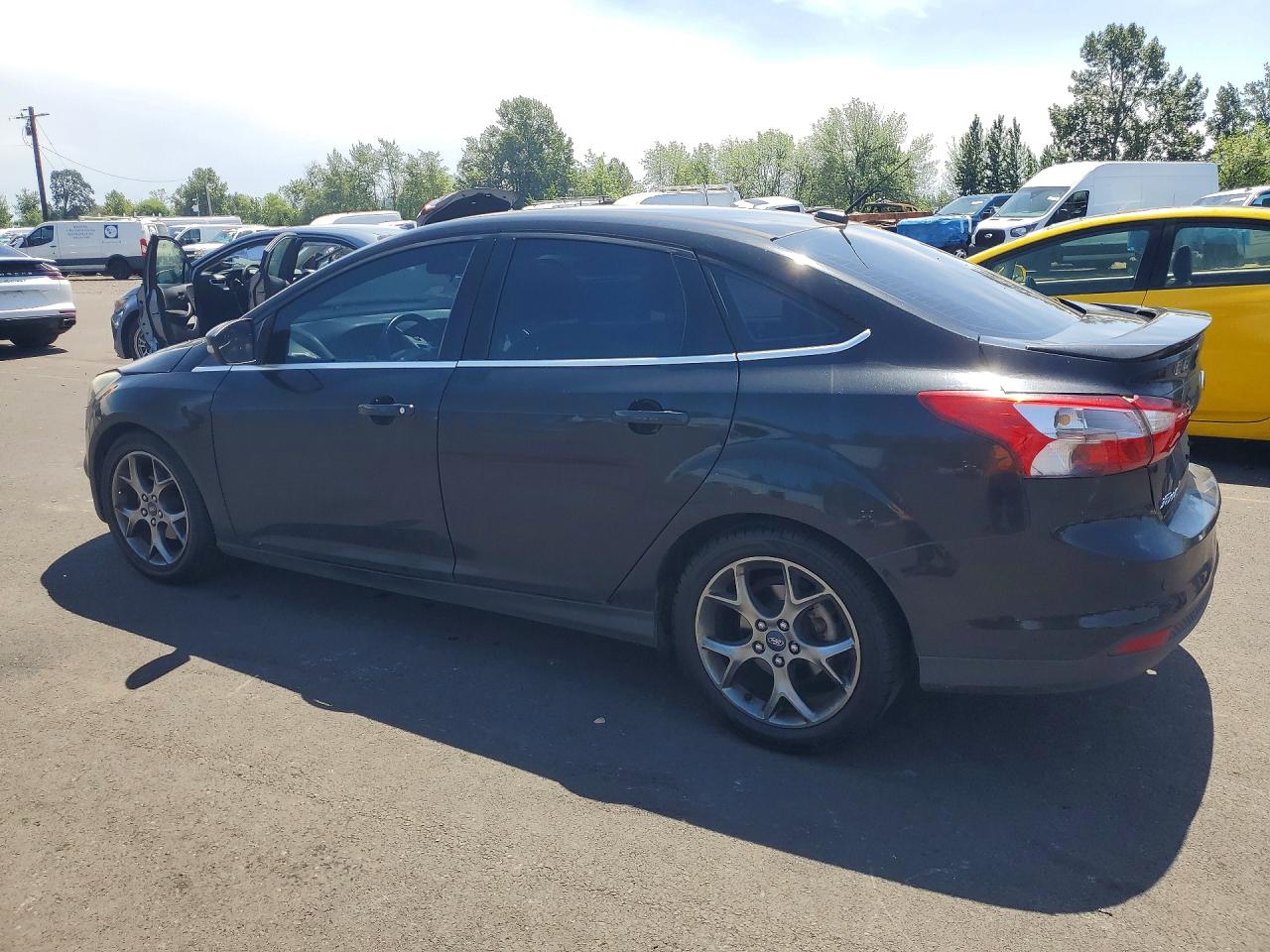 2014 Ford Focus Titanium Black vin: 1FADP3J20EL433232