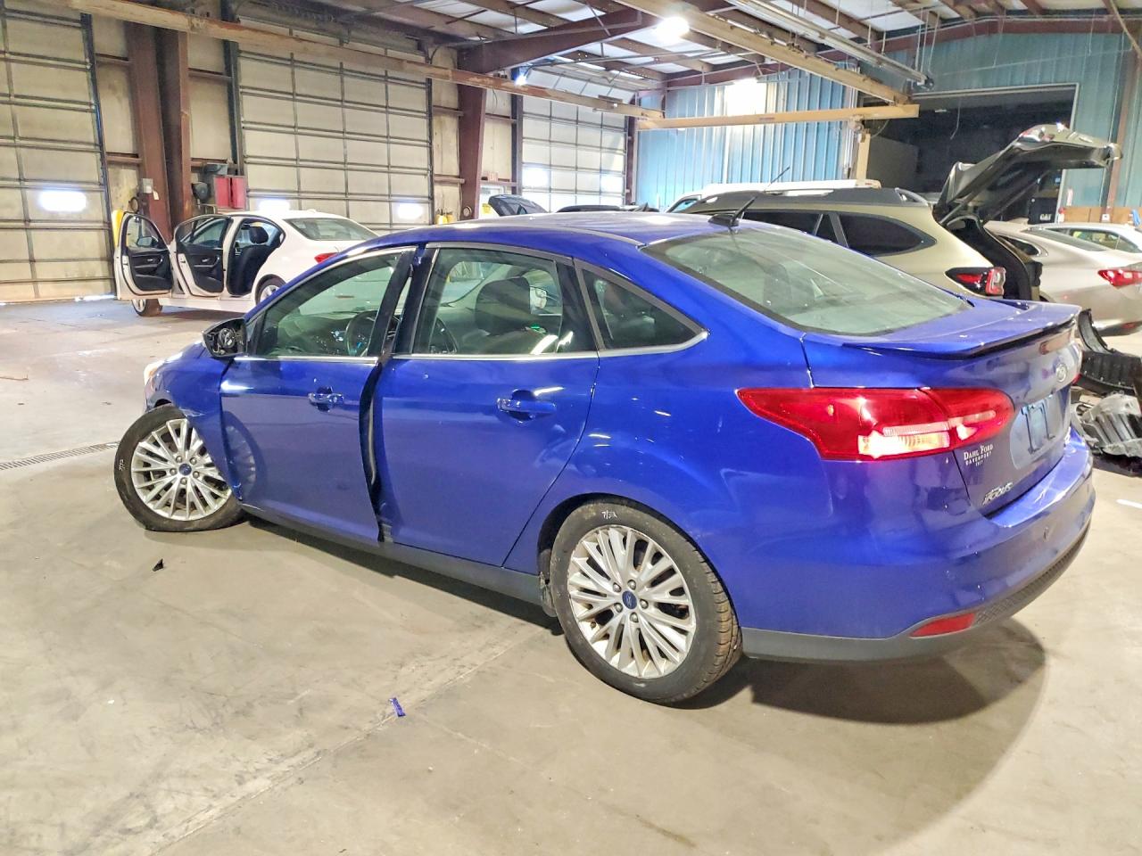 2015 Ford Focus Titanium Blue vin: 1FADP3J20FL216667