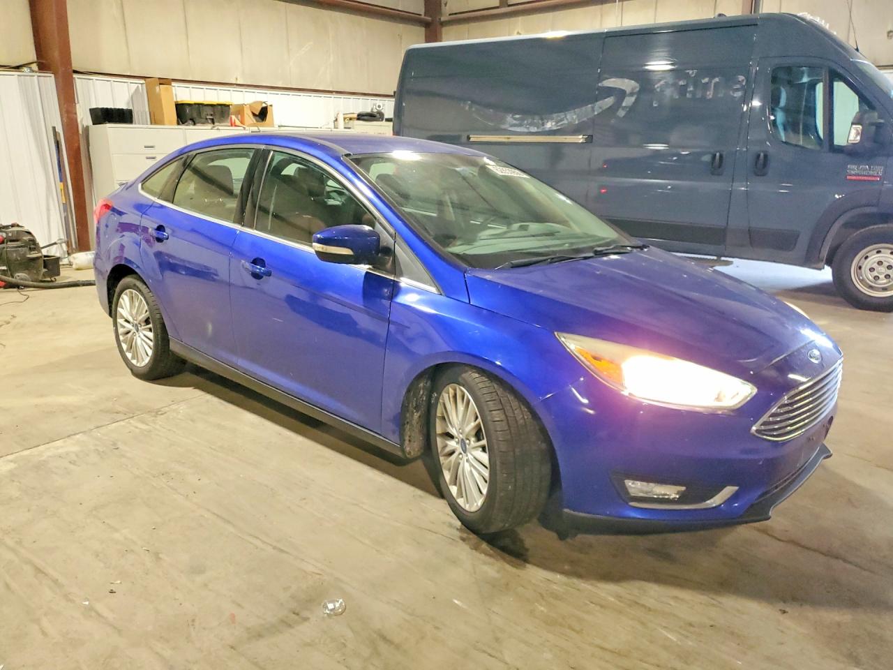 2015 Ford Focus Titanium Blue vin: 1FADP3J20FL216667