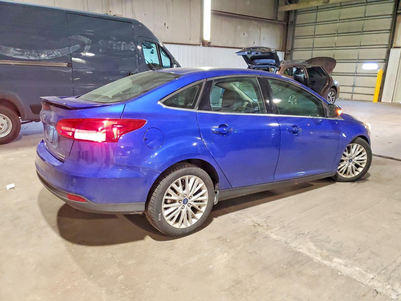 2015 Ford Focus Titanium Blue vin: 1FADP3J20FL216667