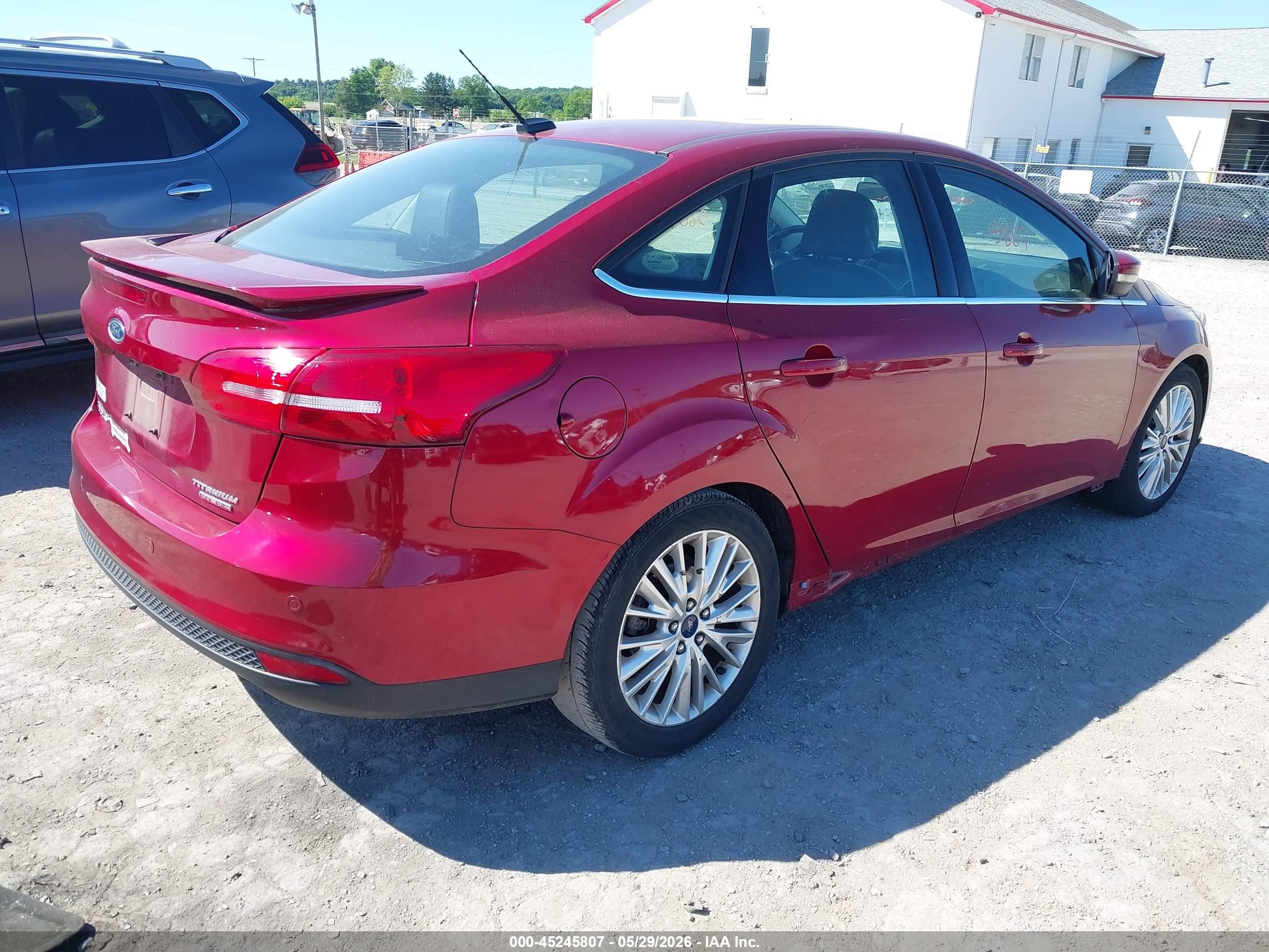 2015 Ford Focus Titanium Red vin: 1FADP3J20FL254920