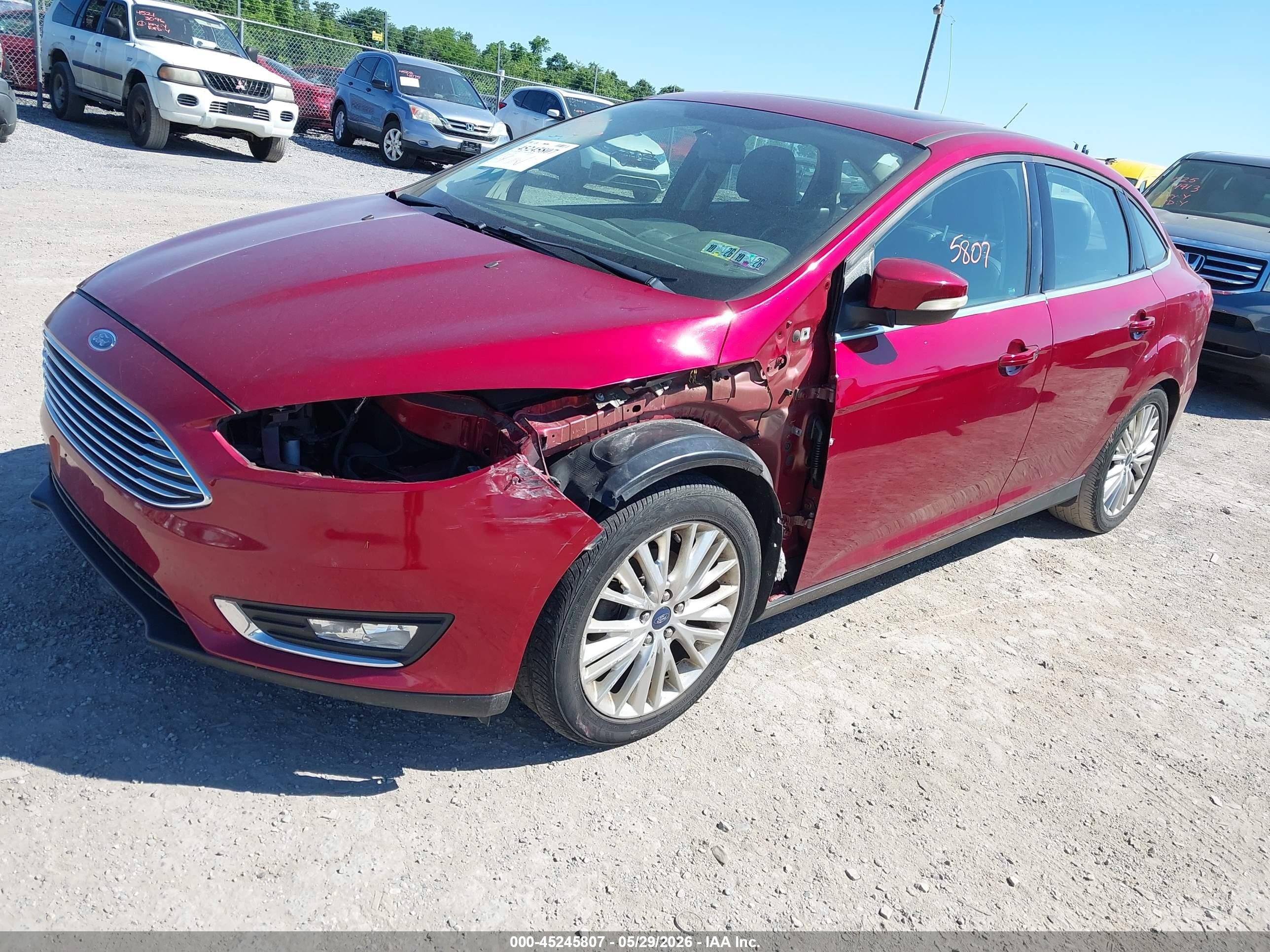 2015 Ford Focus Titanium Red vin: 1FADP3J20FL254920