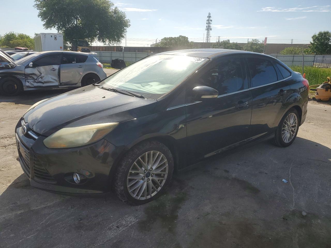 2013 Ford Focus Titanium Black vin: 1FADP3J21DL300073