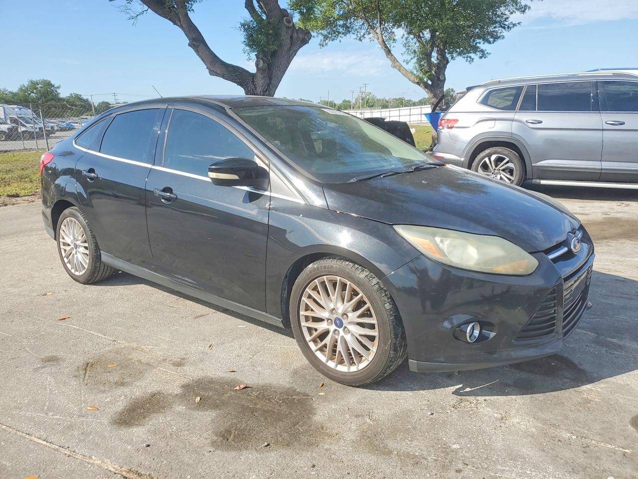 2013 Ford Focus Titanium Black vin: 1FADP3J21DL300073