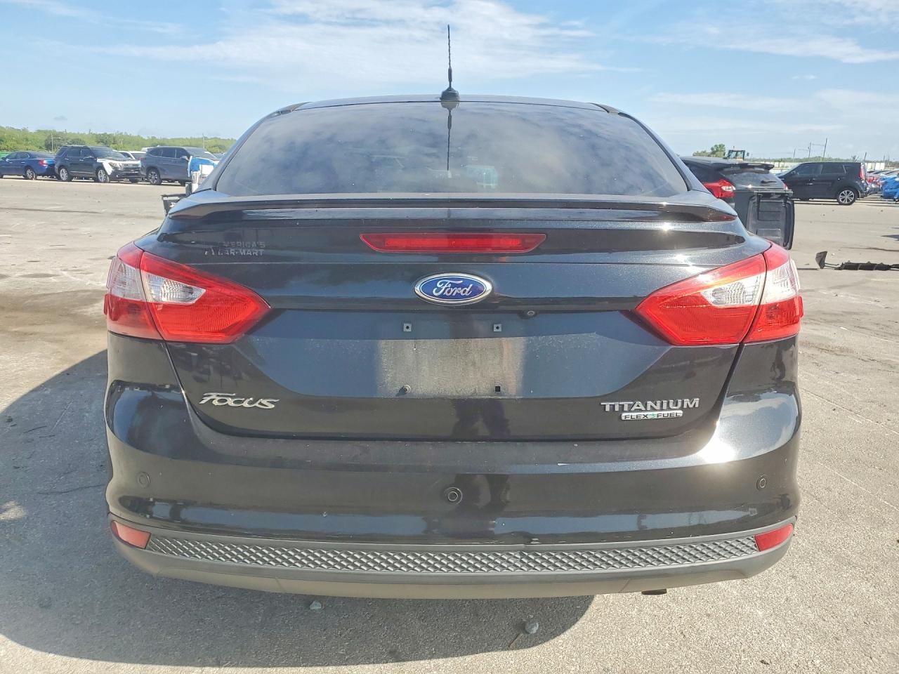 2013 Ford Focus Titanium Black vin: 1FADP3J21DL300073