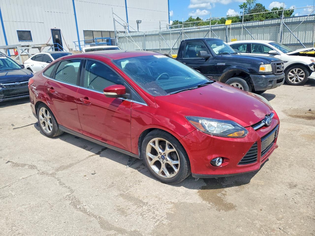 2014 Ford Focus Titanium Red vin: 1FADP3J21EL228664