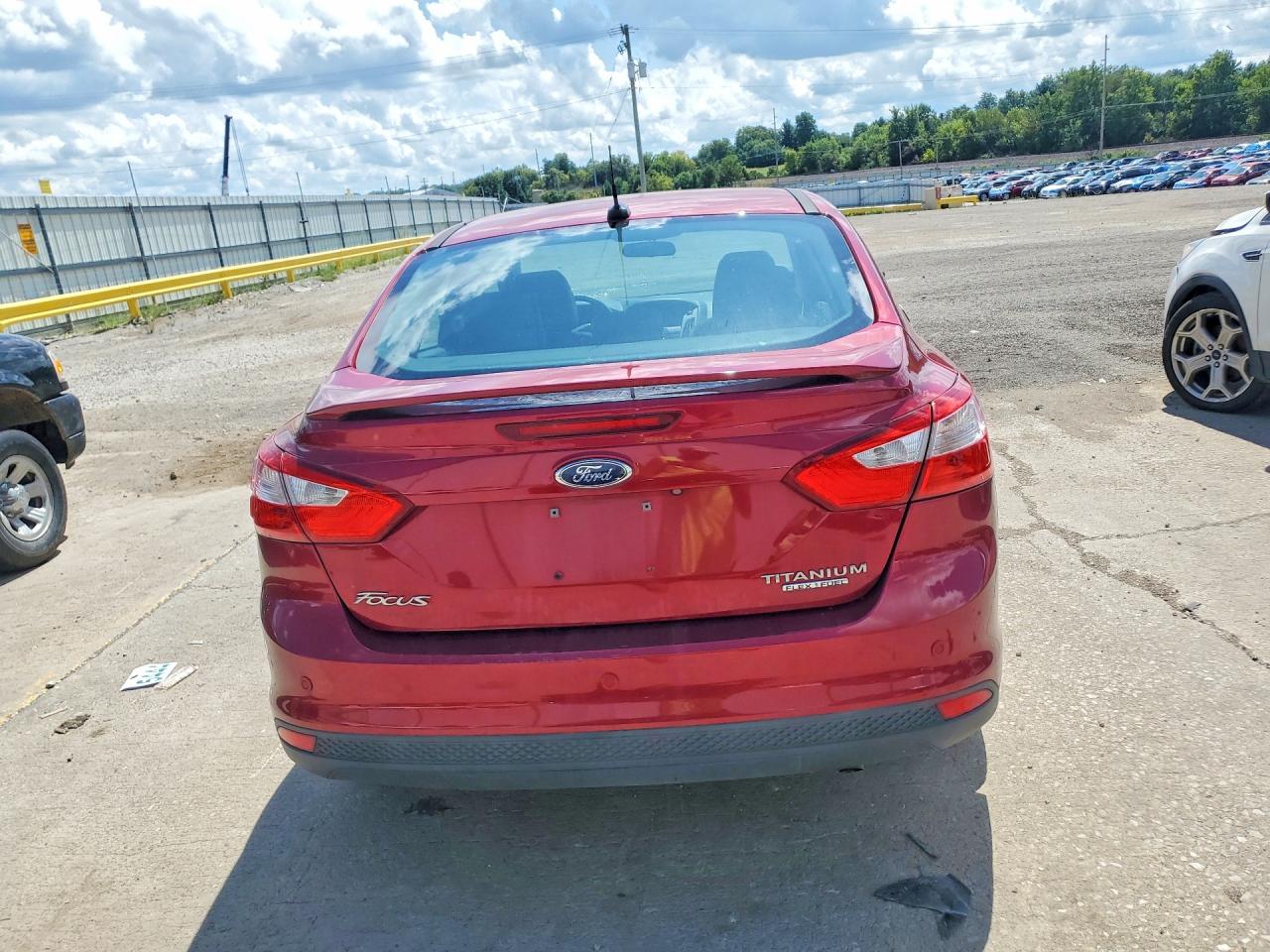 2014 Ford Focus Titanium Red vin: 1FADP3J21EL228664