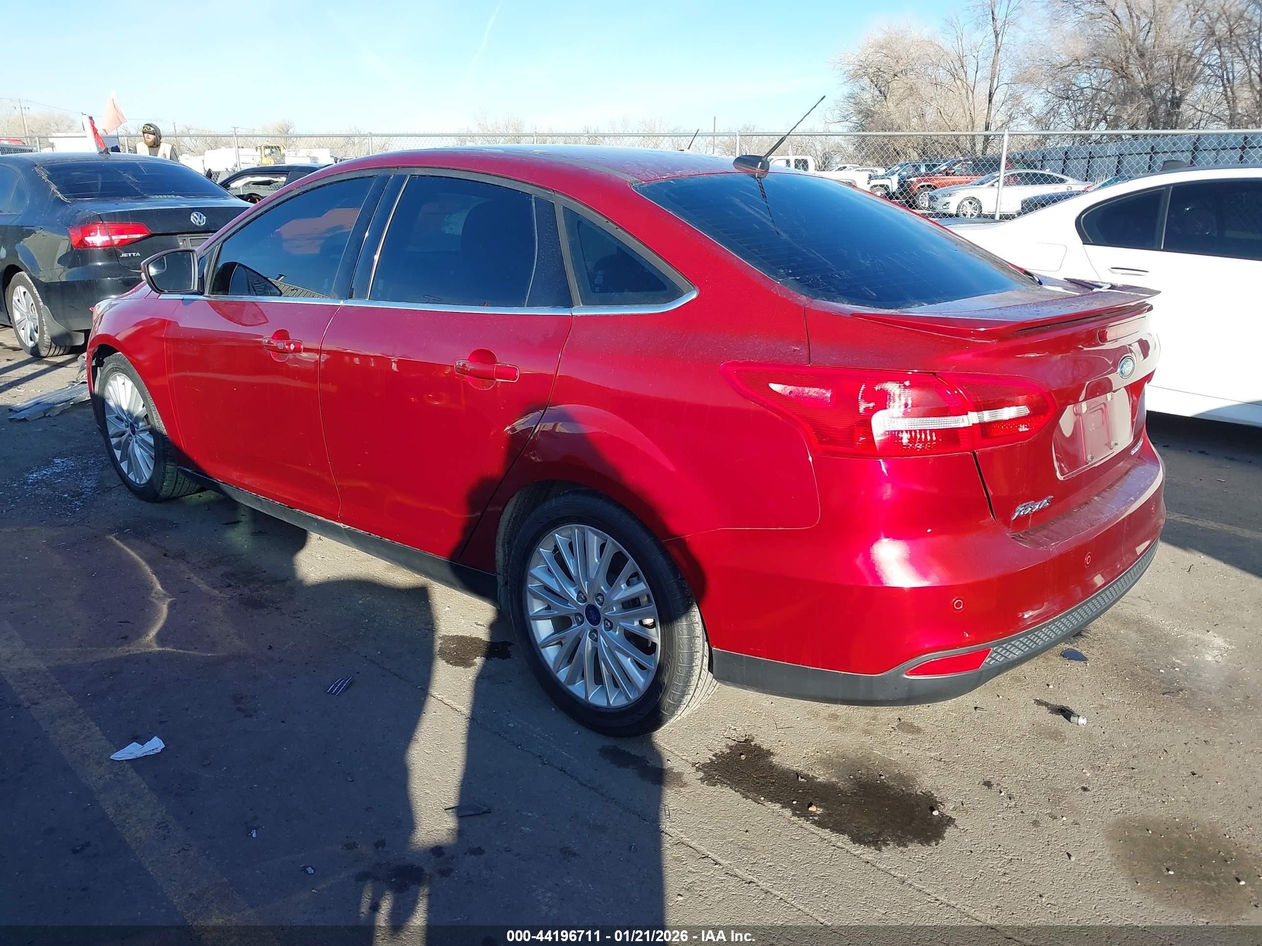 2015 Ford Focus Titanium Red vin: 1FADP3J21FL235485