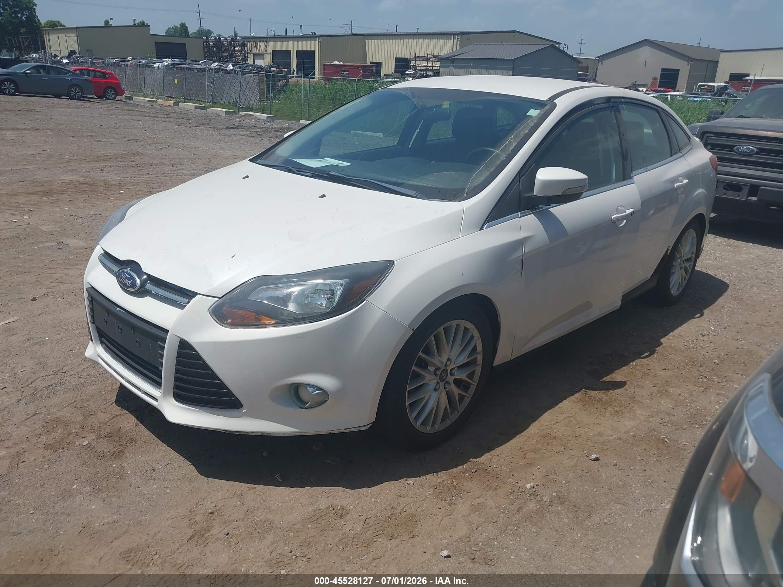 2014 Ford Focus Titanium White vin: 1FADP3J22EL217799
