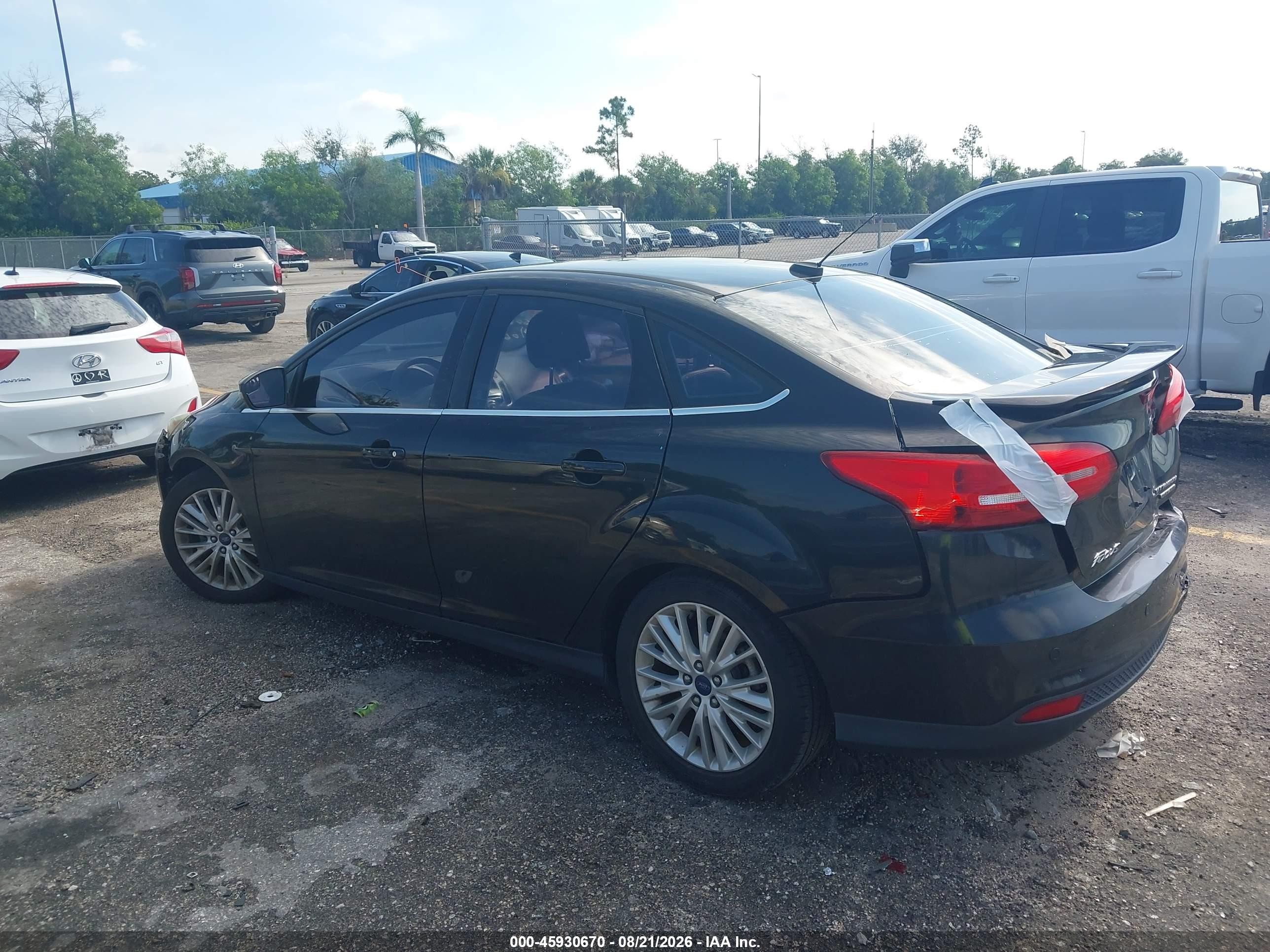 2015 Ford Focus Titanium Black vin: 1FADP3J22FL267720