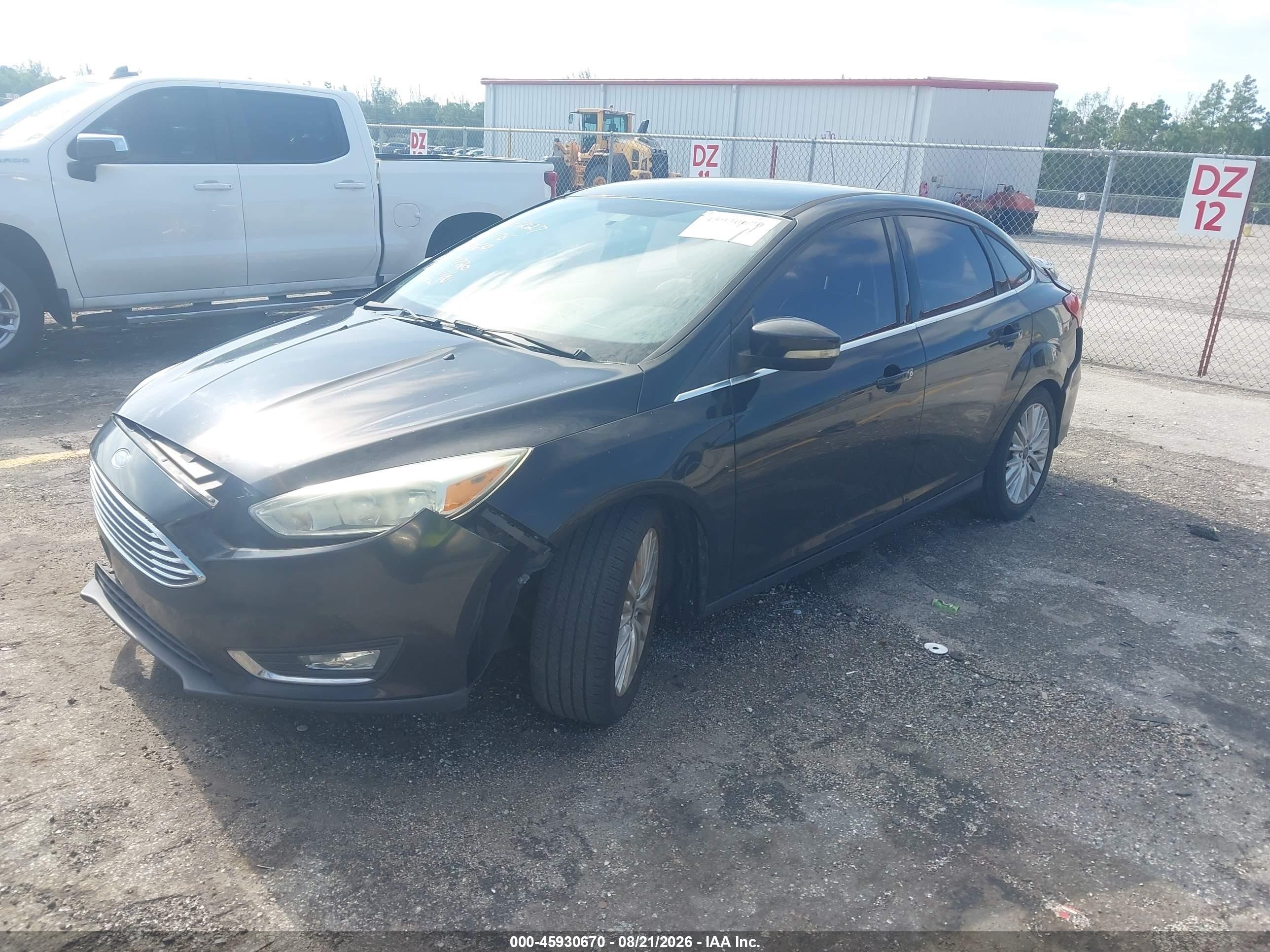 2015 Ford Focus Titanium Black vin: 1FADP3J22FL267720