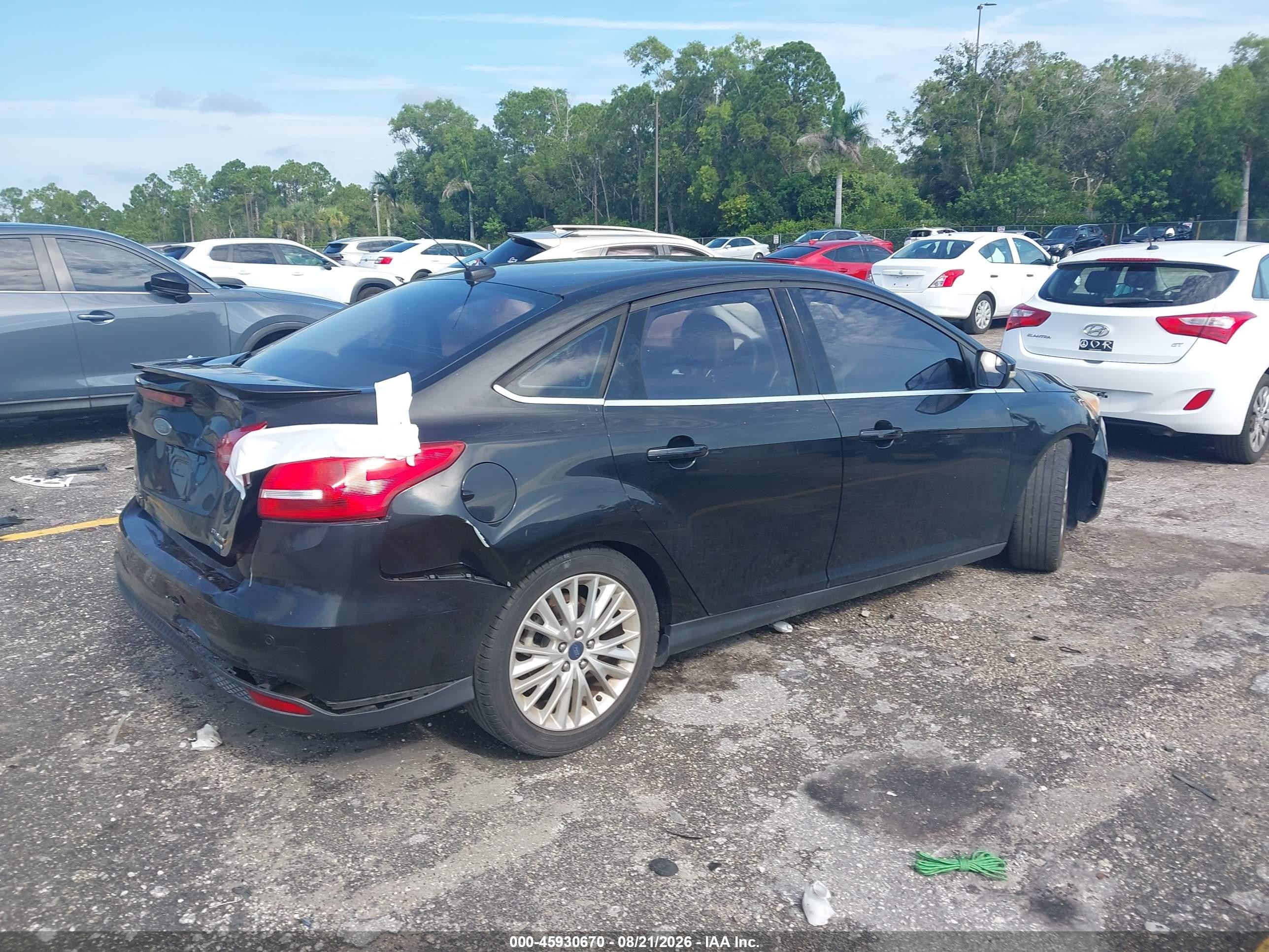 2015 Ford Focus Titanium Black vin: 1FADP3J22FL267720