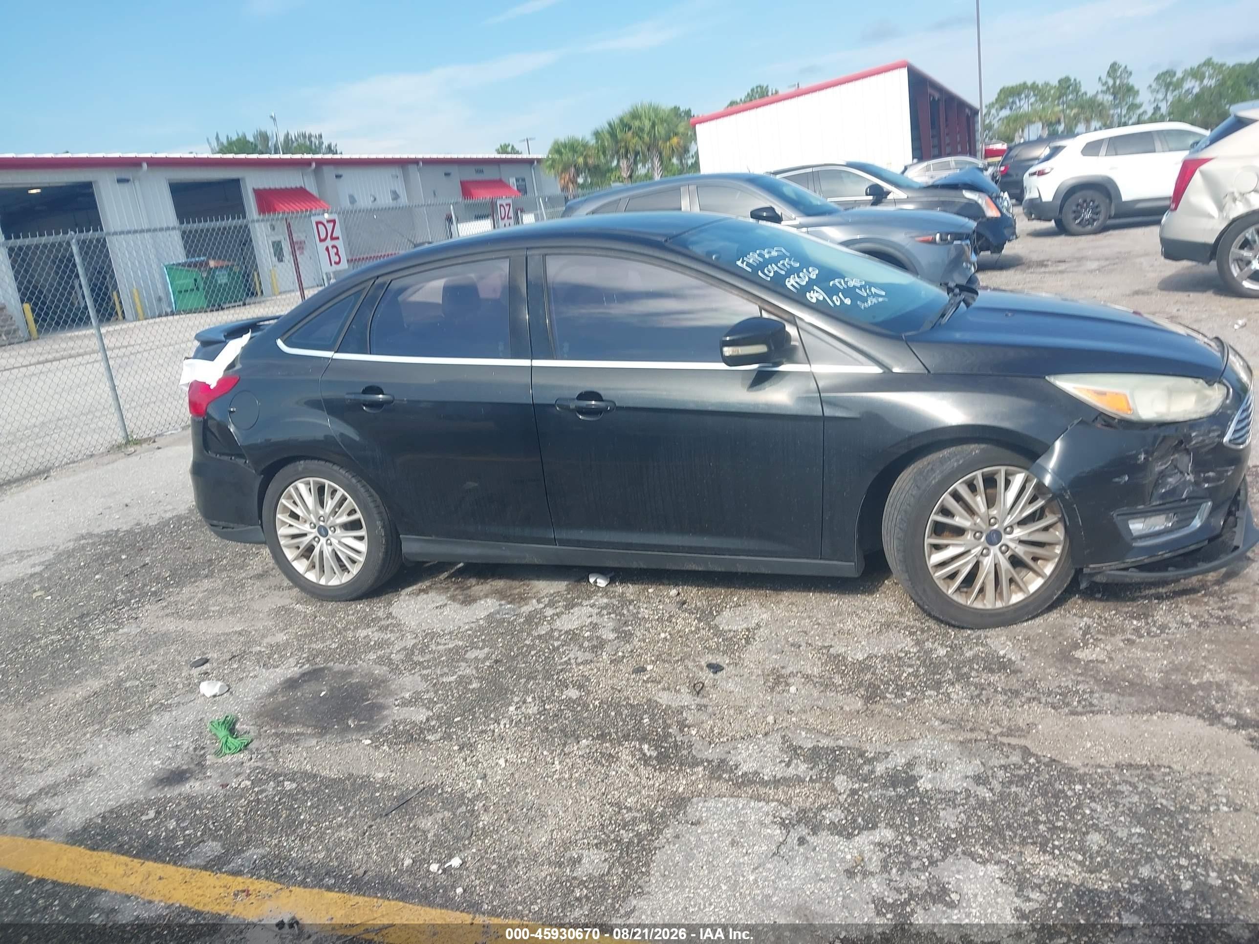 2015 Ford Focus Titanium Black vin: 1FADP3J22FL267720