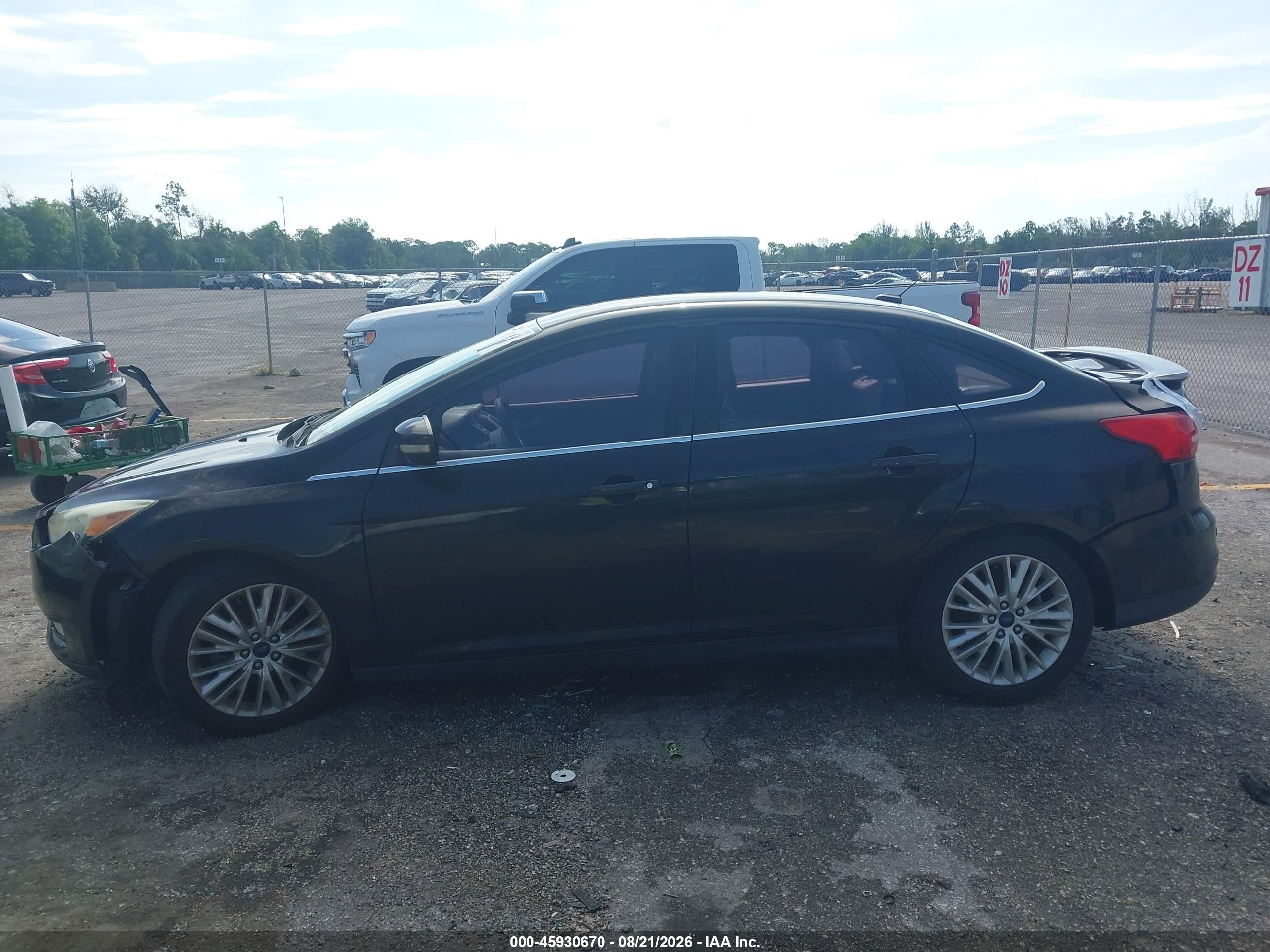 2015 Ford Focus Titanium Black vin: 1FADP3J22FL267720