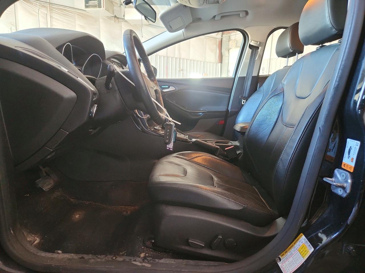 2015 Ford Focus Titanium Black vin: 1FADP3J22FL305088