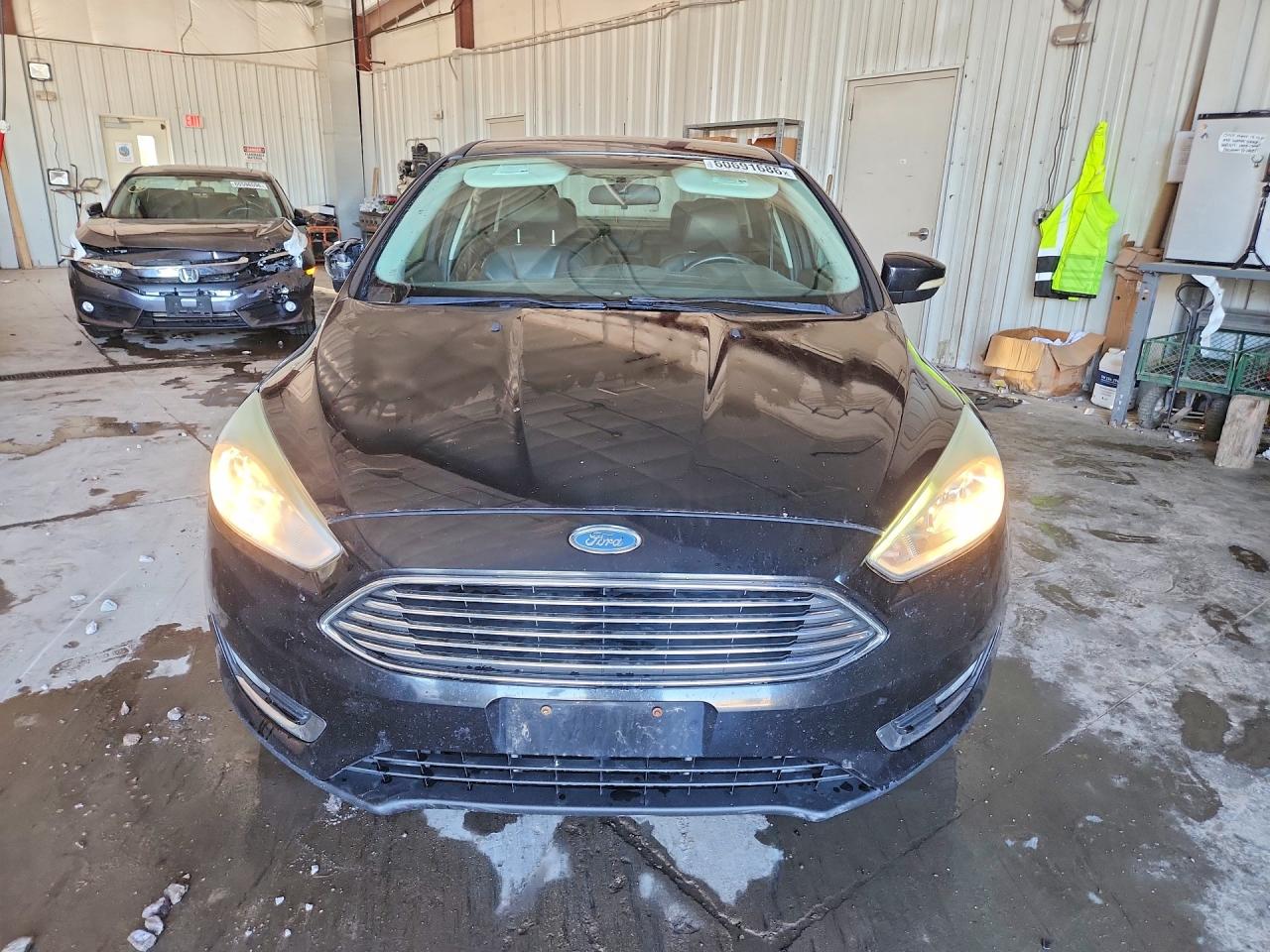 2015 Ford Focus Titanium Black vin: 1FADP3J22FL305088