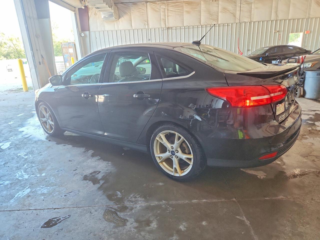 2015 Ford Focus Titanium Black vin: 1FADP3J22FL305088