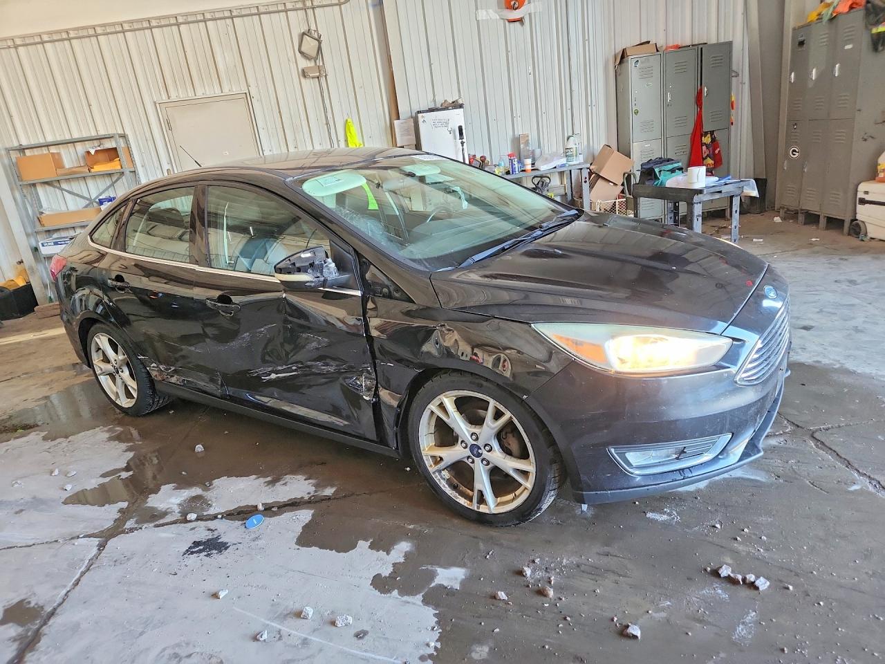2015 Ford Focus Titanium Black vin: 1FADP3J22FL305088