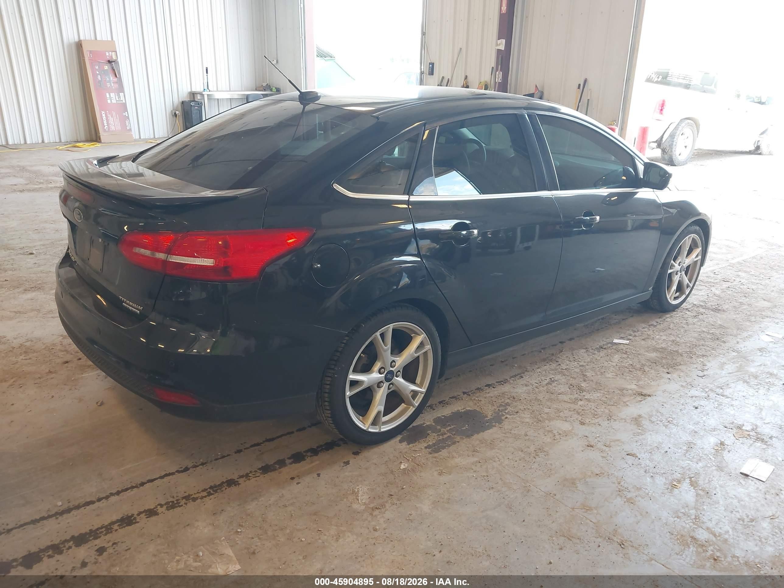 2015 Ford Focus Titanium Black vin: 1FADP3J22FL327561