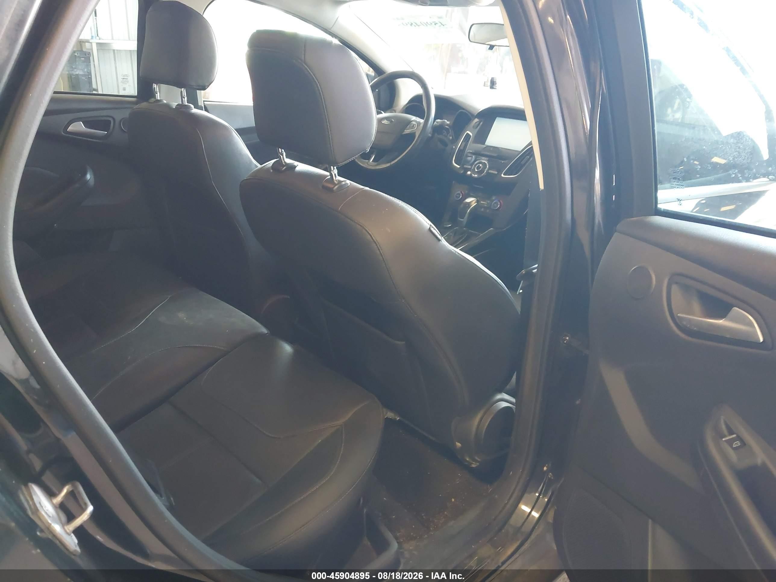 2015 Ford Focus Titanium Black vin: 1FADP3J22FL327561