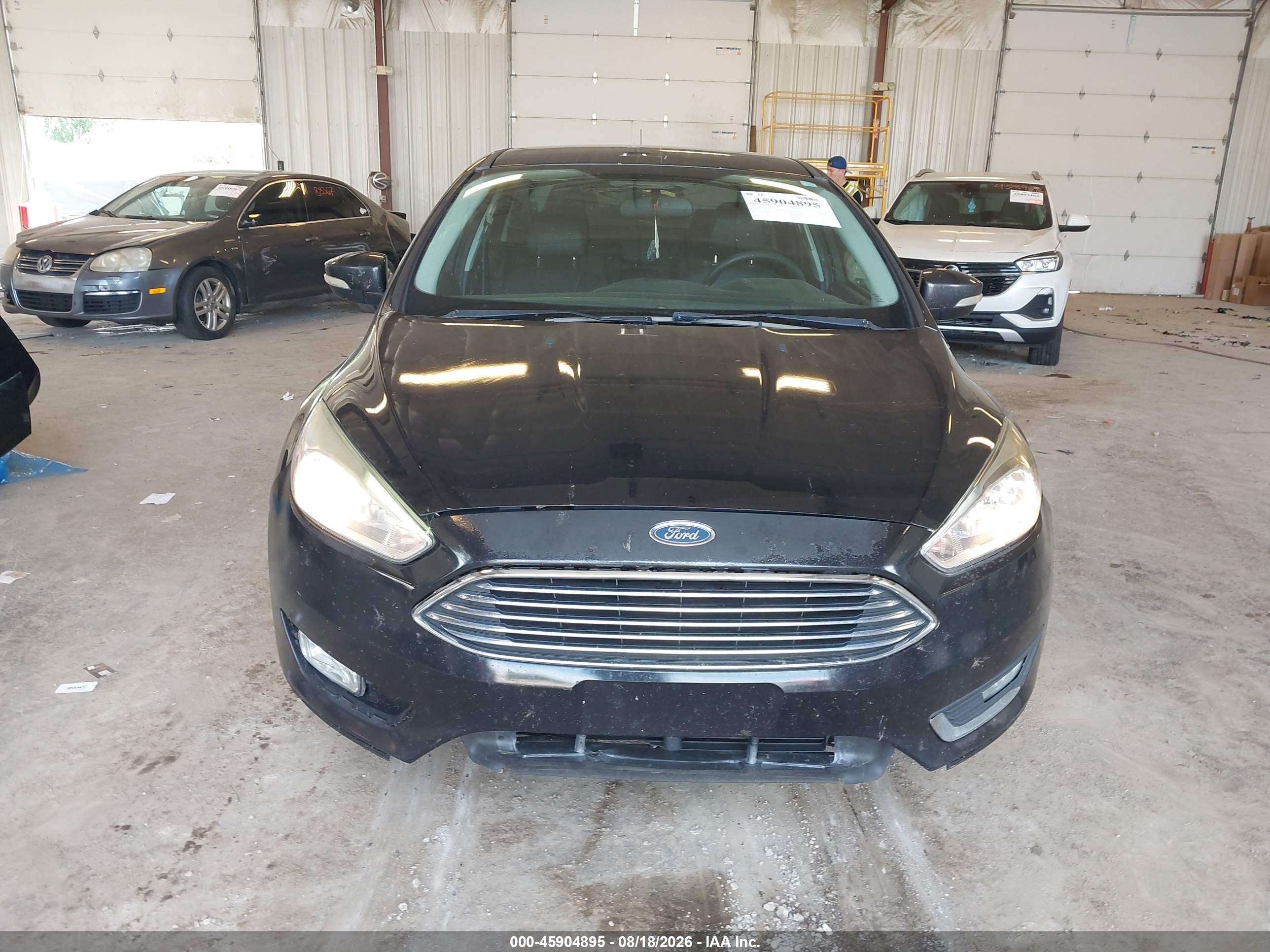 2015 Ford Focus Titanium Black vin: 1FADP3J22FL327561
