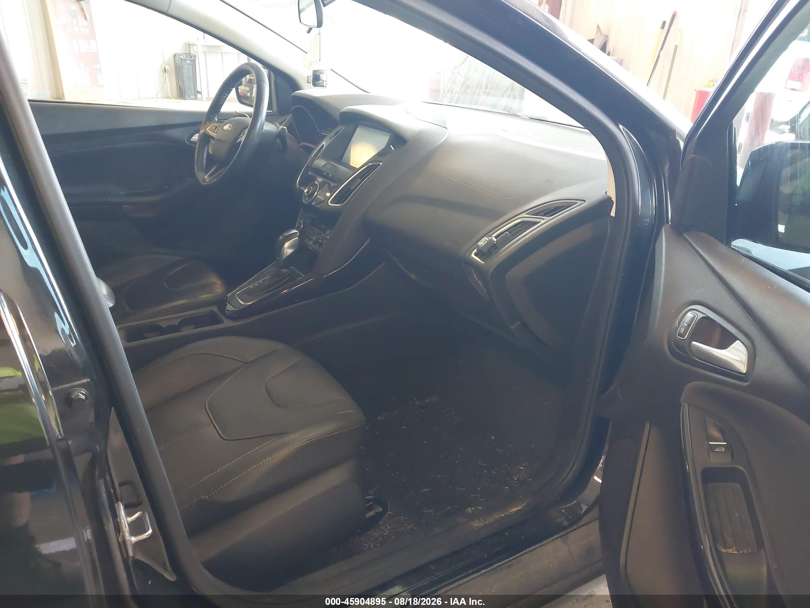 2015 Ford Focus Titanium Black vin: 1FADP3J22FL327561