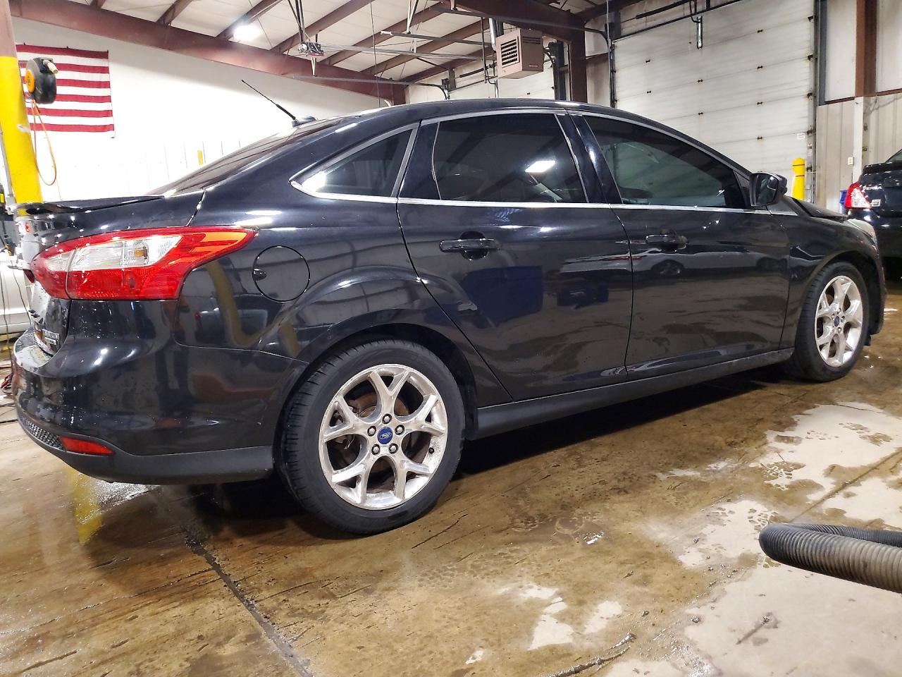 2013 Ford Focus Titanium Черный vin: 1FADP3J23DL217387