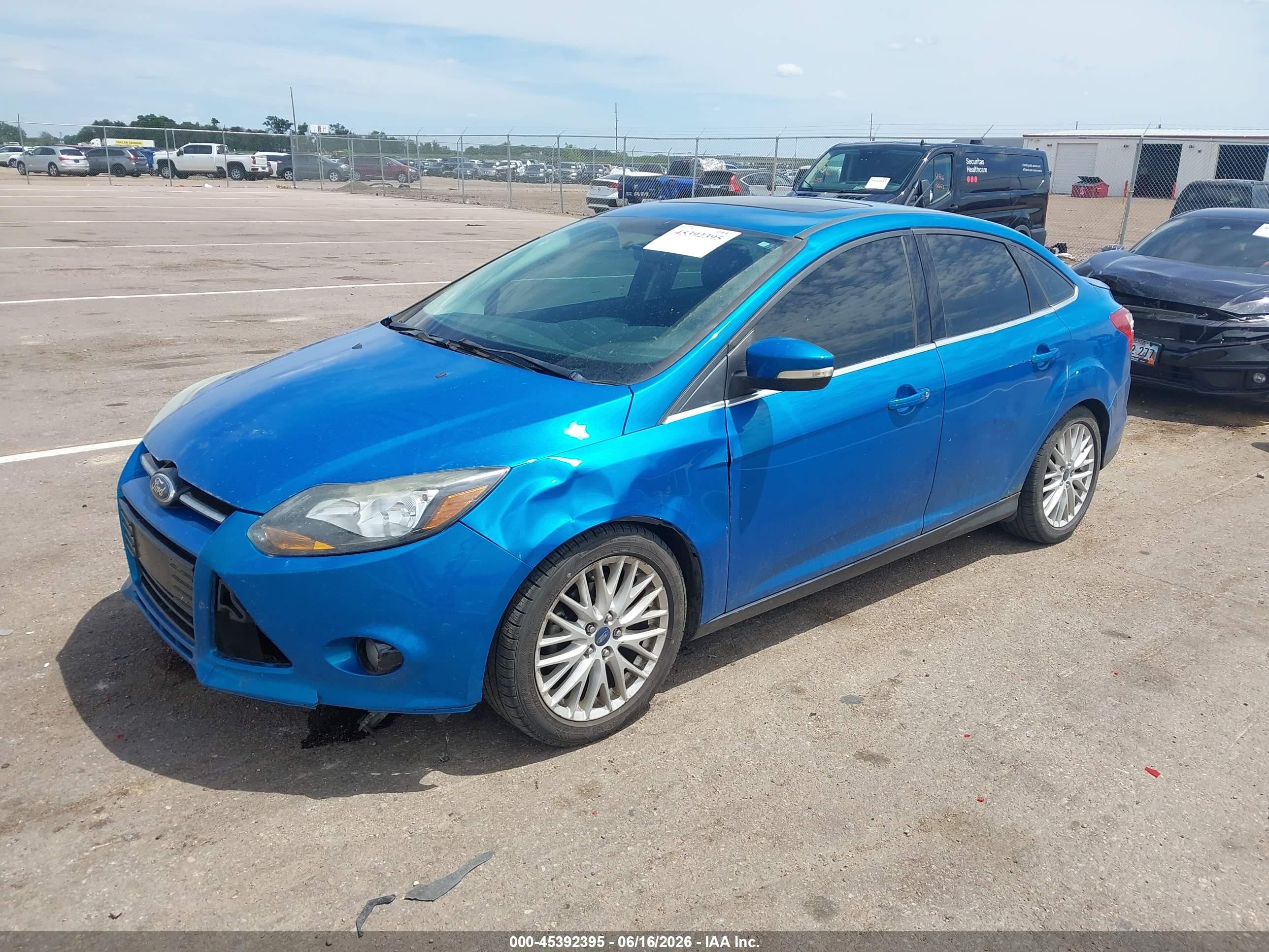2014 Ford Focus Titanium Blue vin: 1FADP3J23EL118277