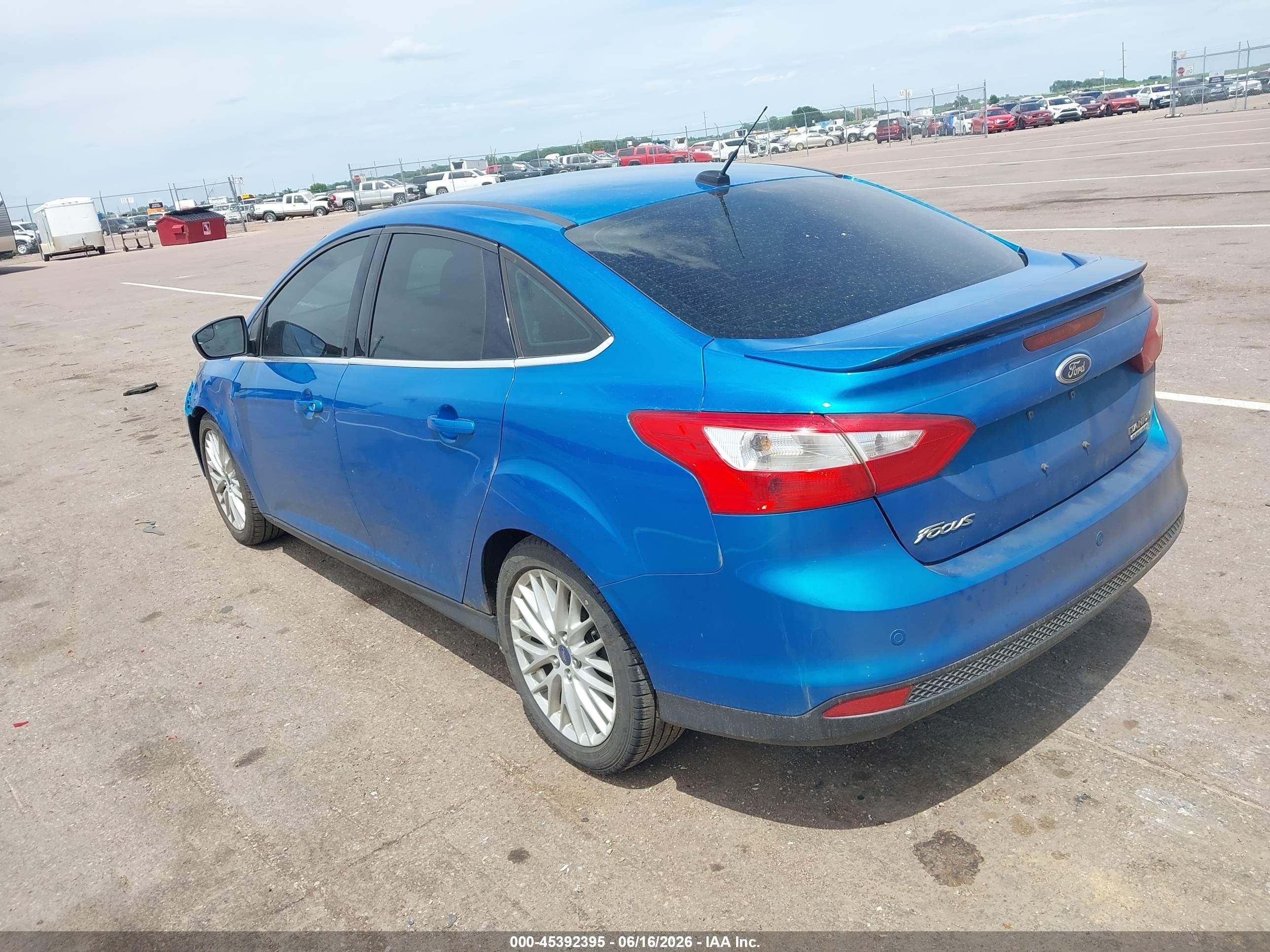 2014 Ford Focus Titanium Blue vin: 1FADP3J23EL118277
