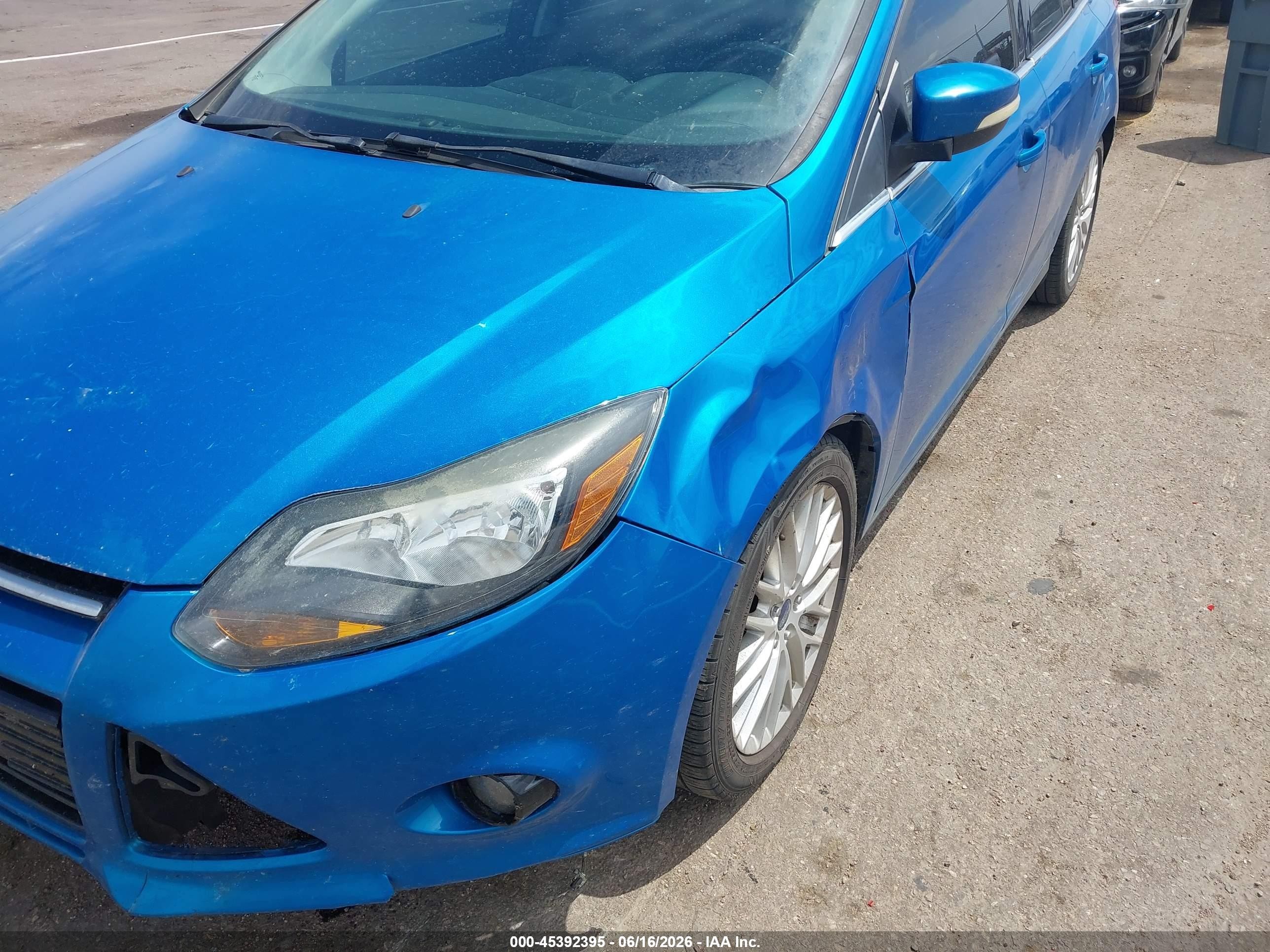 2014 Ford Focus Titanium Blue vin: 1FADP3J23EL118277