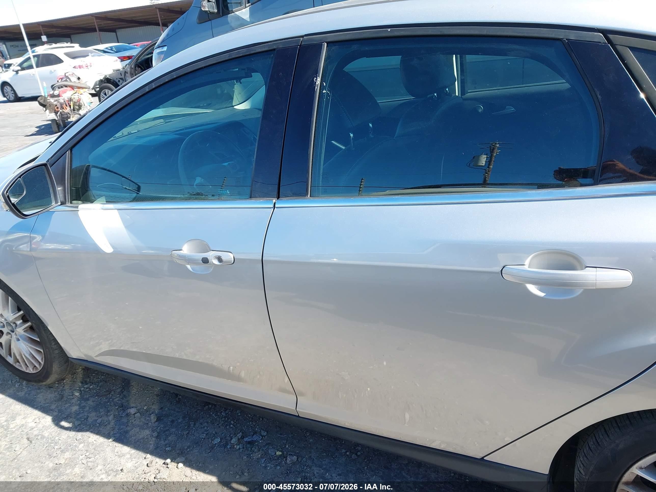 2014 Ford Focus Titanium Silver vin: 1FADP3J23EL264548