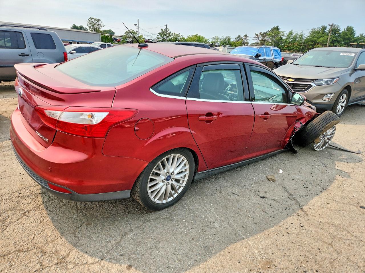 2014 Ford Focus Titanium Red vin: 1FADP3J23EL274299