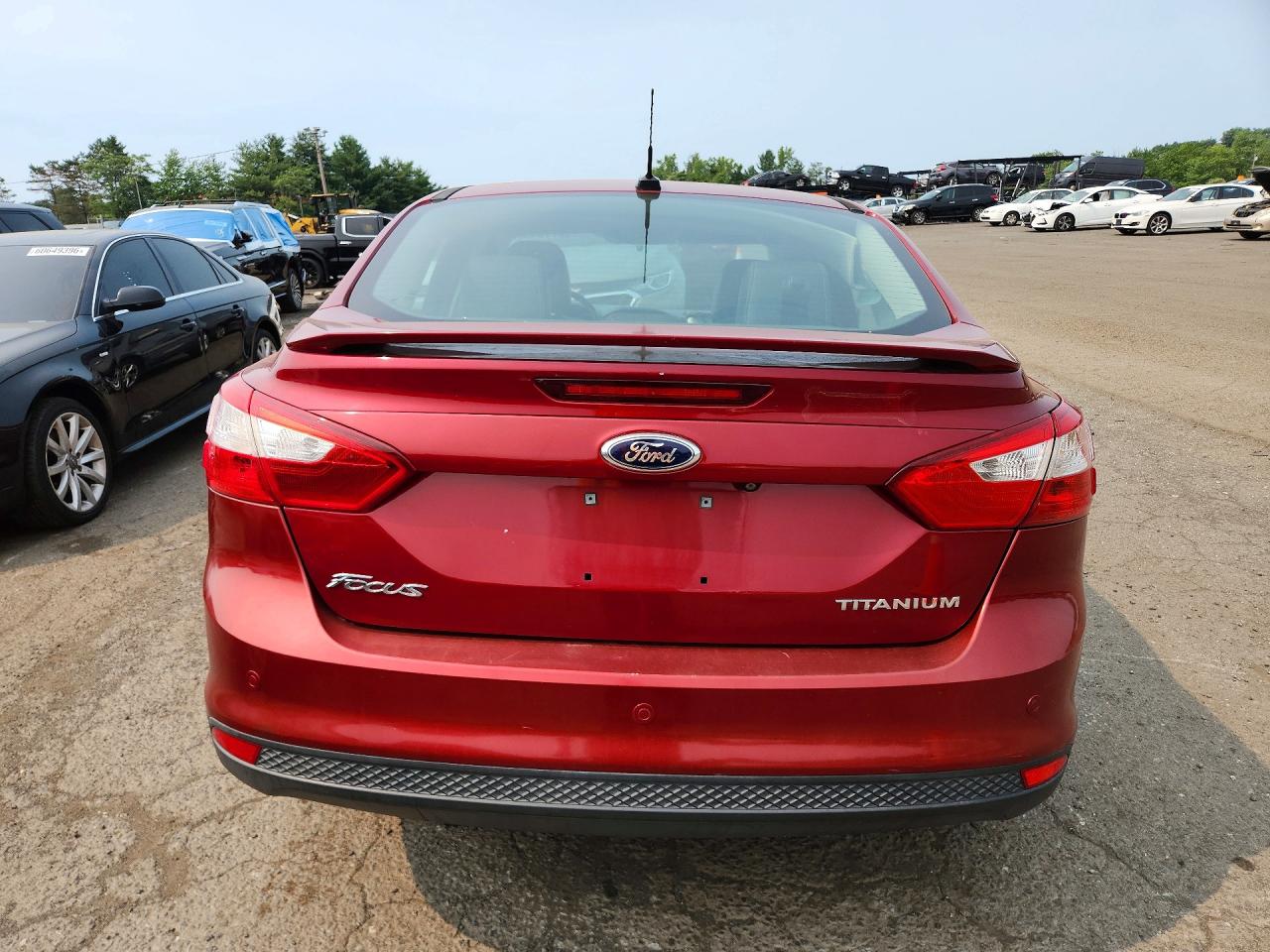 2014 Ford Focus Titanium Red vin: 1FADP3J23EL274299