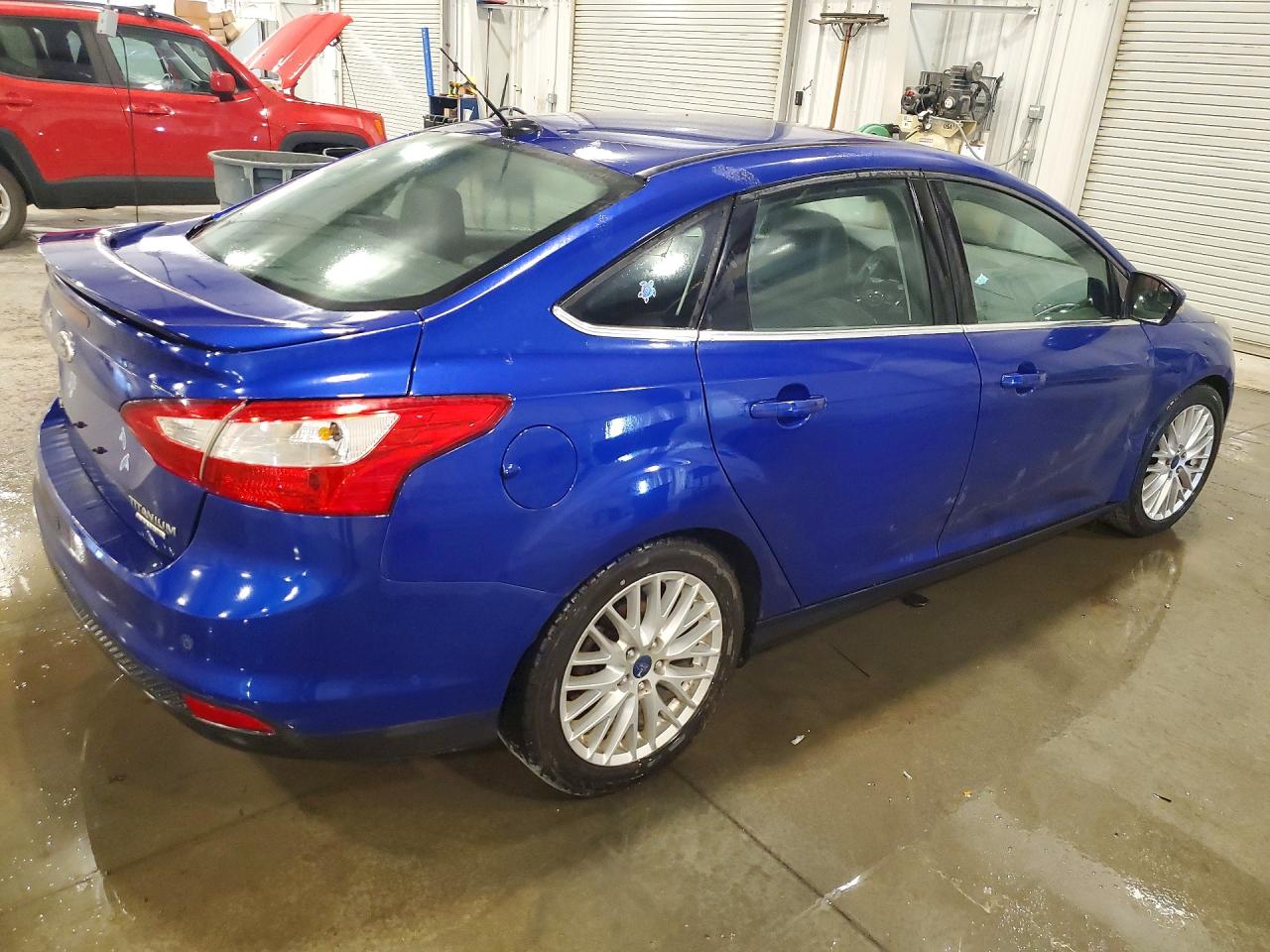 2014 Ford Focus Titanium Blue vin: 1FADP3J23EL374046