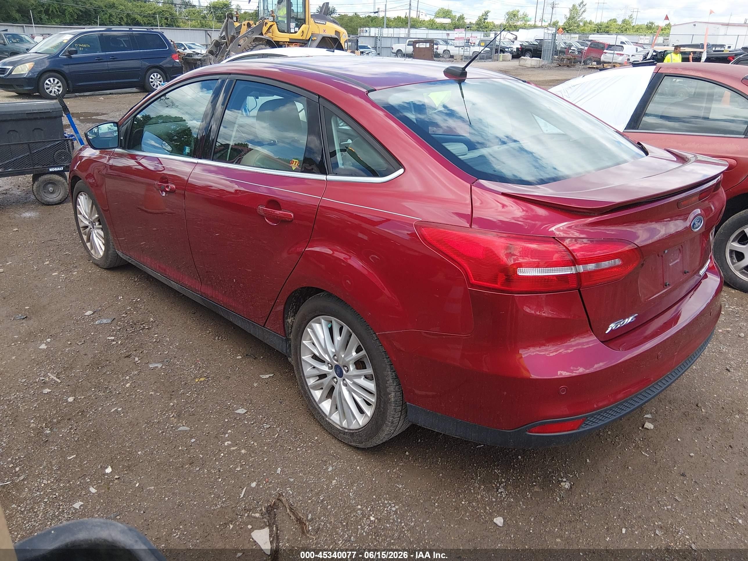 2015 Ford Focus Titanium Burgundy vin: 1FADP3J23FL383783