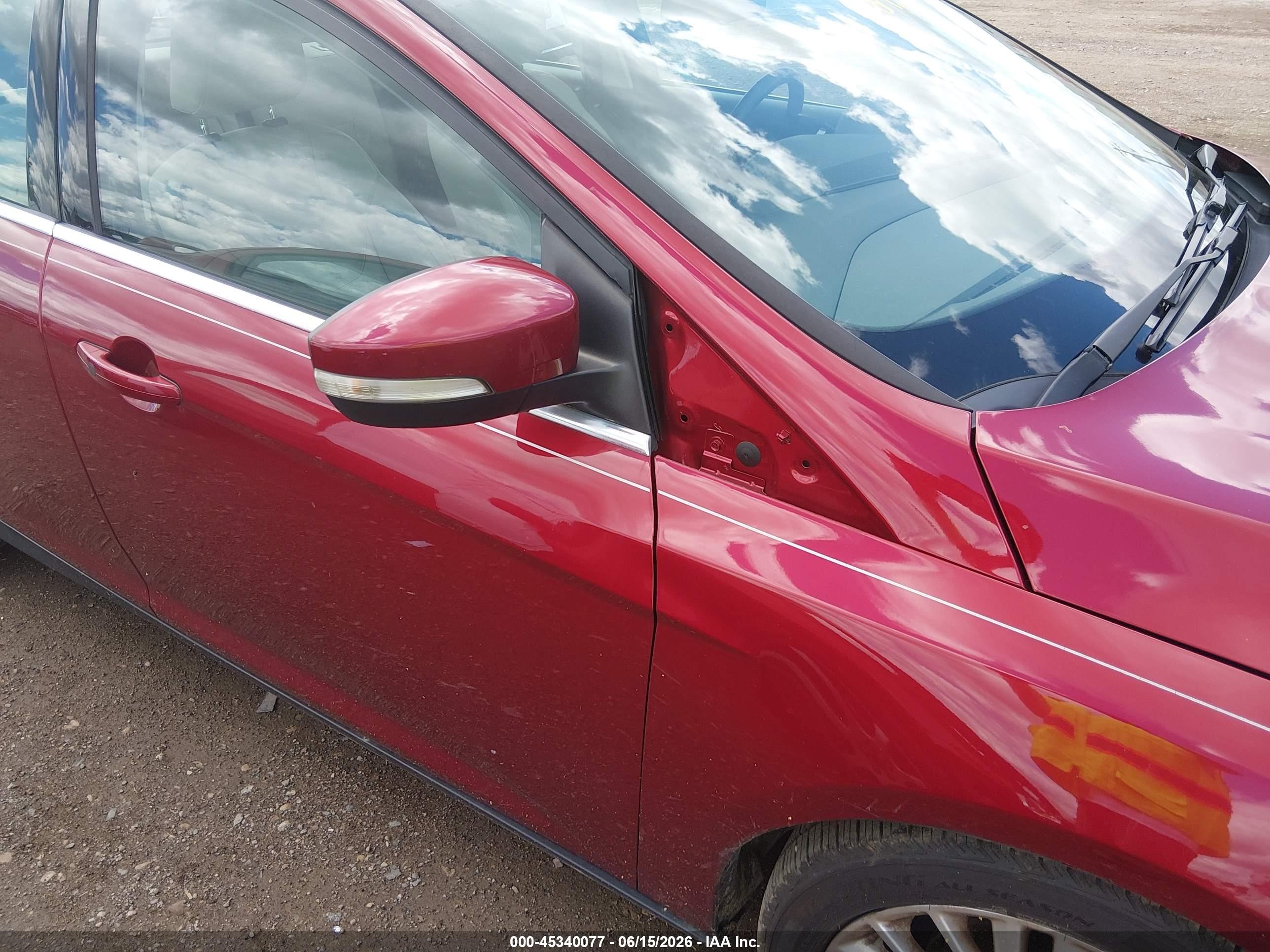 2015 Ford Focus Titanium Burgundy vin: 1FADP3J23FL383783