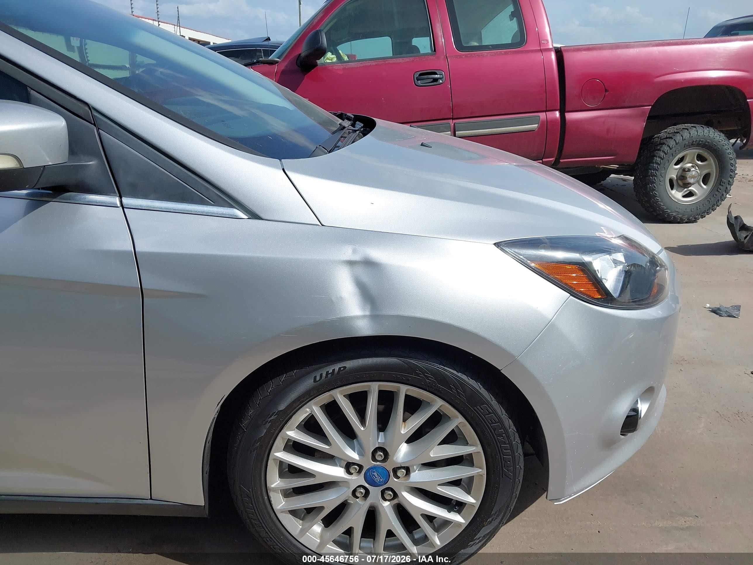 2013 Ford Focus Titanium Серебряный vin: 1FADP3J24DL200212