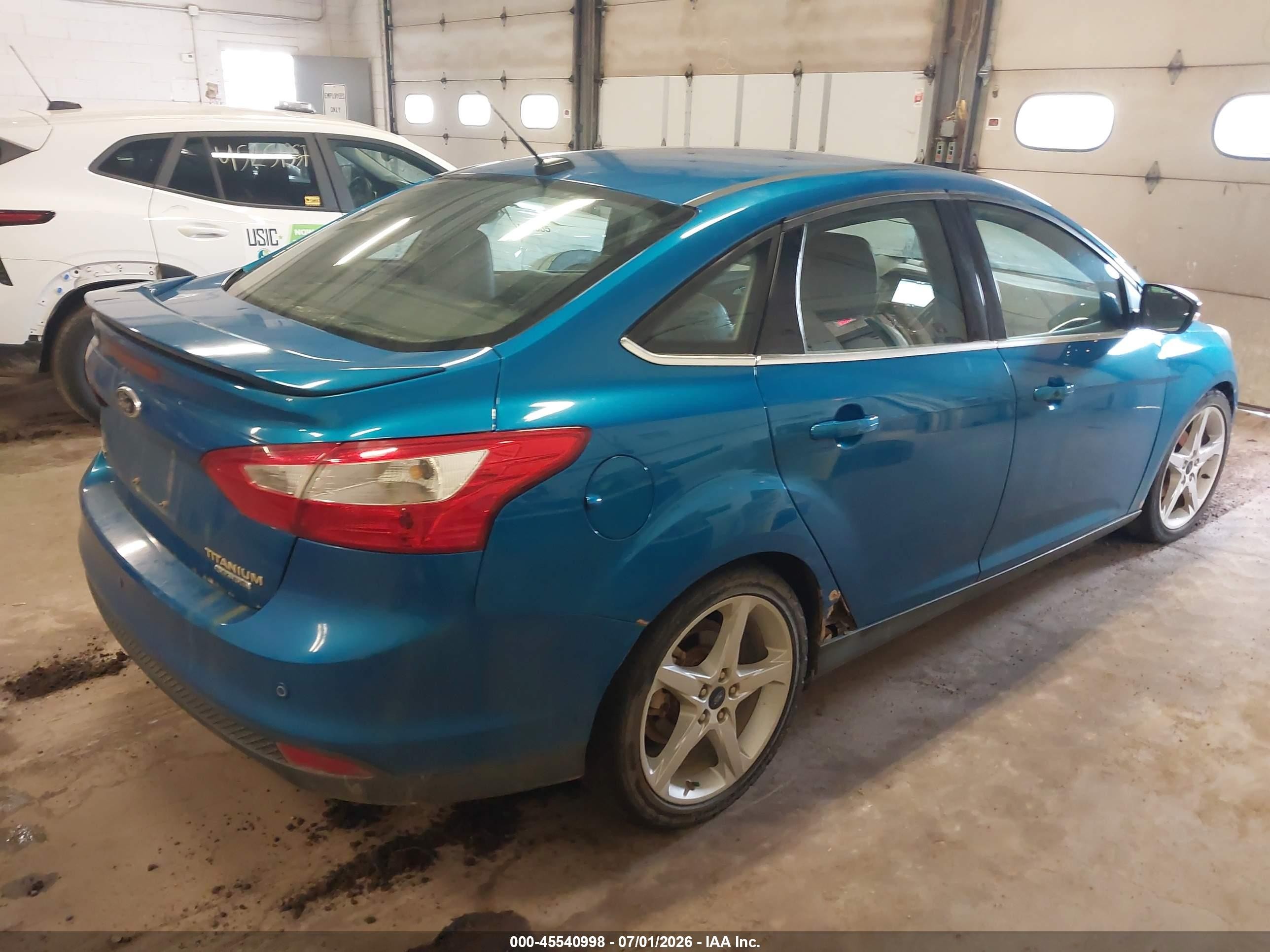 2014 Ford Focus Titanium Blue vin: 1FADP3J24EL399179