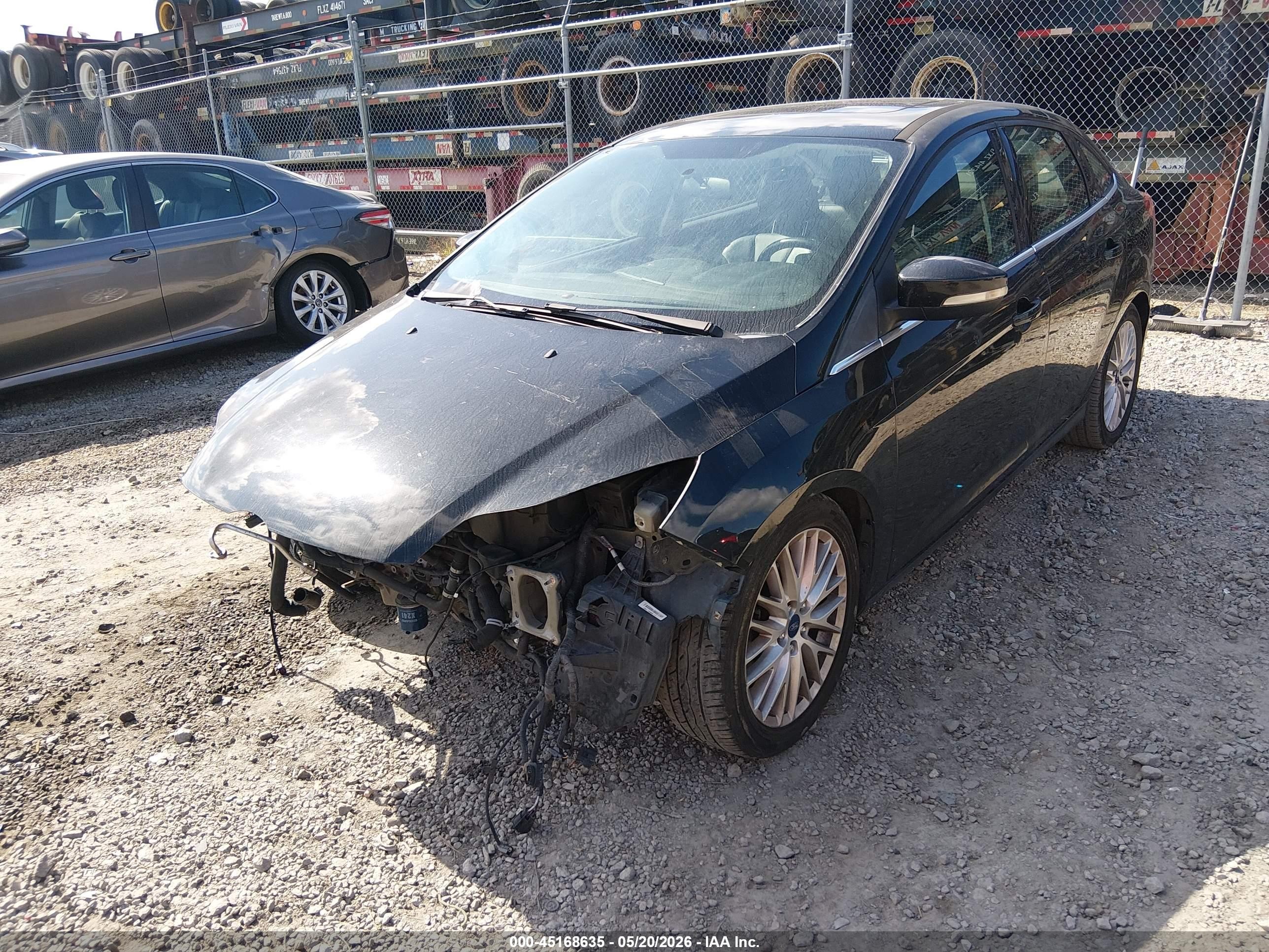 2014 Ford Focus Titanium Black vin: 1FADP3J24EL447456