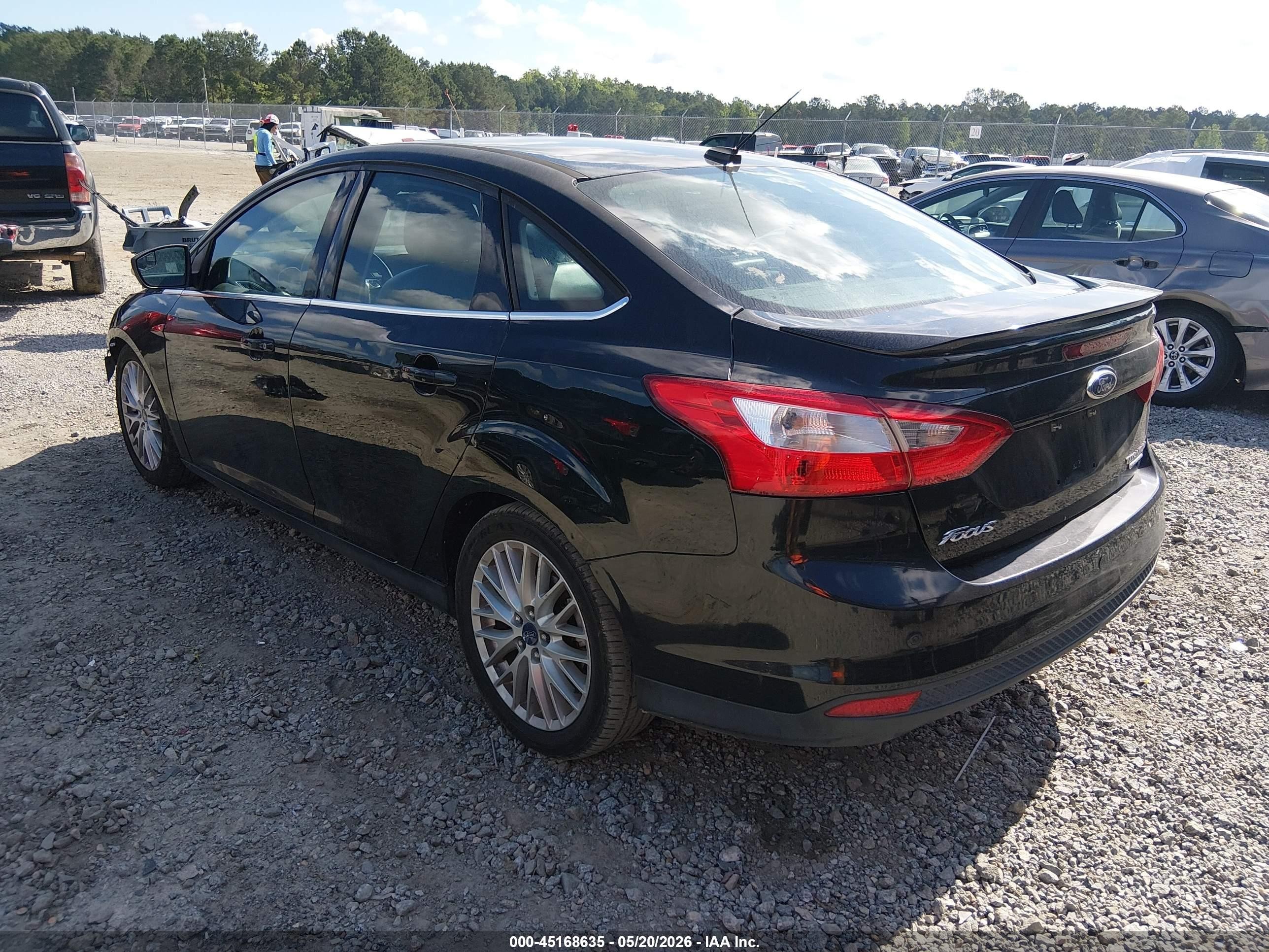 2014 Ford Focus Titanium Black vin: 1FADP3J24EL447456
