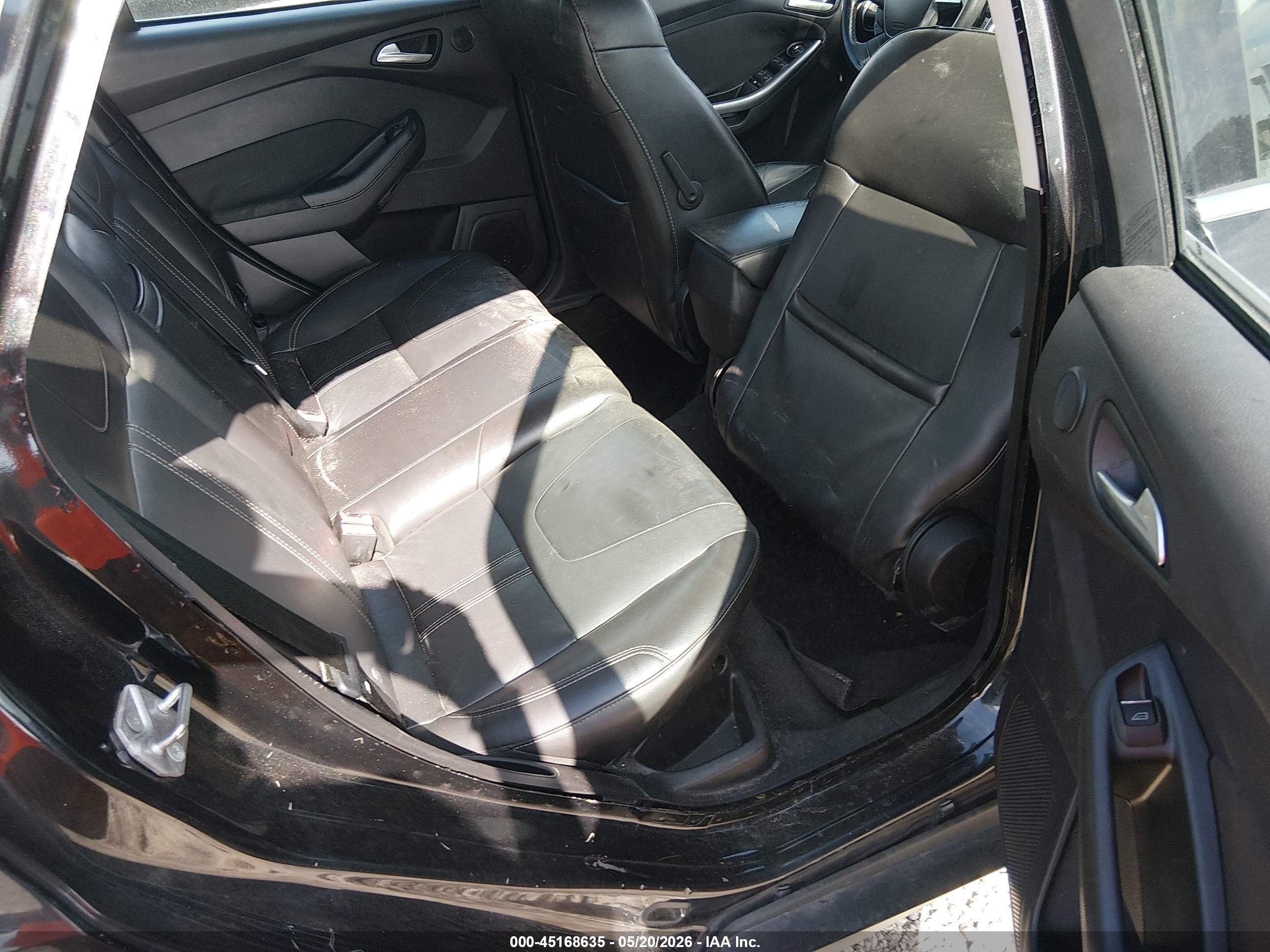 2014 Ford Focus Titanium Black vin: 1FADP3J24EL447456