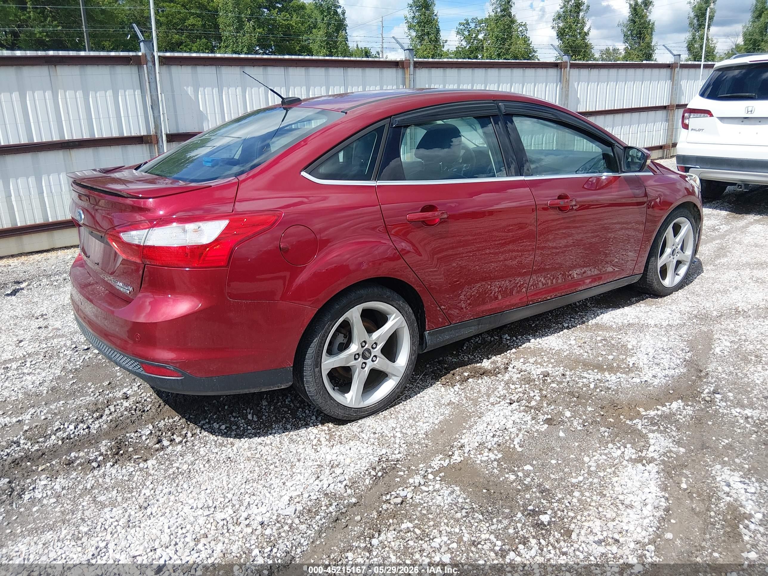 2013 Ford Focus Titanium Red vin: 1FADP3J25DL203538