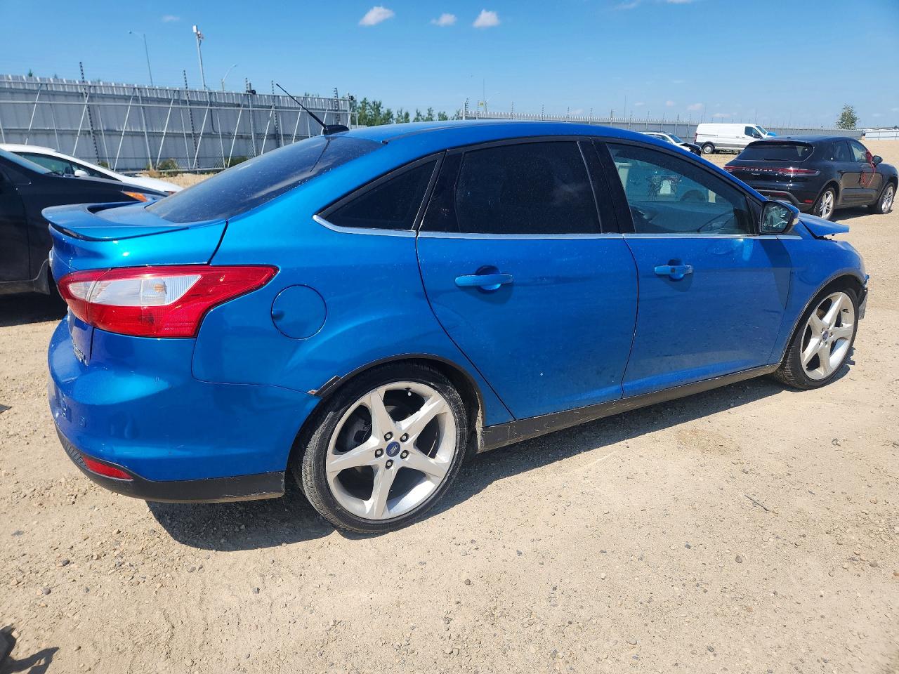 2014 Ford Focus Titanium Blue vin: 1FADP3J25EL146307